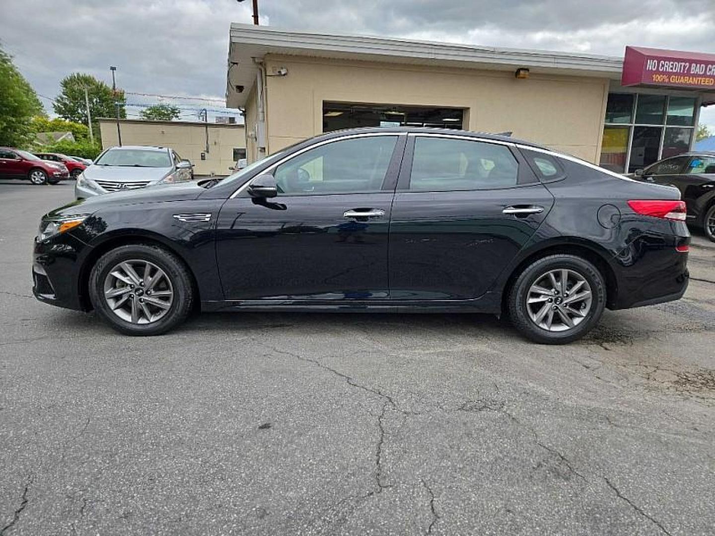 2020 BLACK /BLACK Kia Optima LX (5XXGT4L34LG) with an 2.4L L4 DOHC 16V engine, 6A transmission, located at 3304 Woodville Road, Northwood, OH, 43619, (419) 210-8019, 41.612694, -83.480743 - We are #1 Auto Loan Dealer for Good Bad or No Credit we have hundreds of vehicles to choose from, stop on in or just fill out our online application to get approved for auto financing and see your credit score for free by visiting our website today. We have Low Payment Options and Terms Available - Photo#1