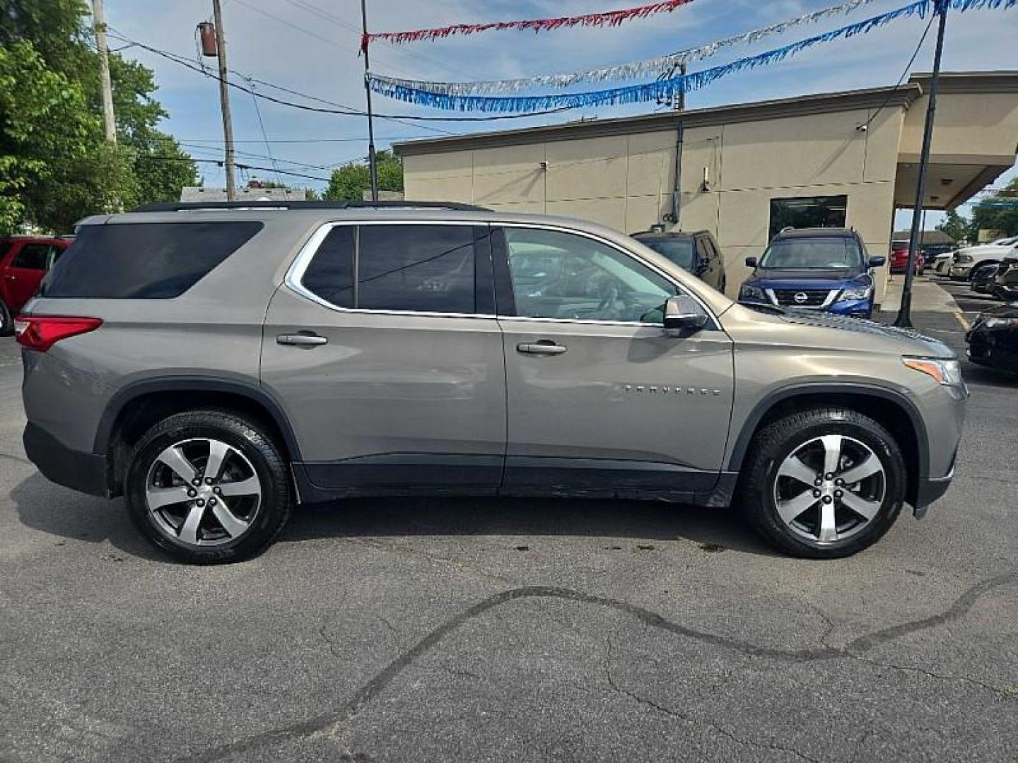 2019 GRAY /TAN Chevrolet Traverse LT Leather FWD (1GNERHKW6KJ) with an 3.6L V6 DOHC 24V engine, 9A transmission, located at 3304 Woodville Road, Northwood, OH, 43619, (419) 210-8019, 41.612694, -83.480743 - We are #1 Auto Loan Dealer for Good Bad or No Credit we have hundreds of vehicles to choose from, stop on in or just fill out our online application to get approved for auto financing and see your credit score for free by visiting our website today. We have Low Payment Options and Terms Available - Photo#5