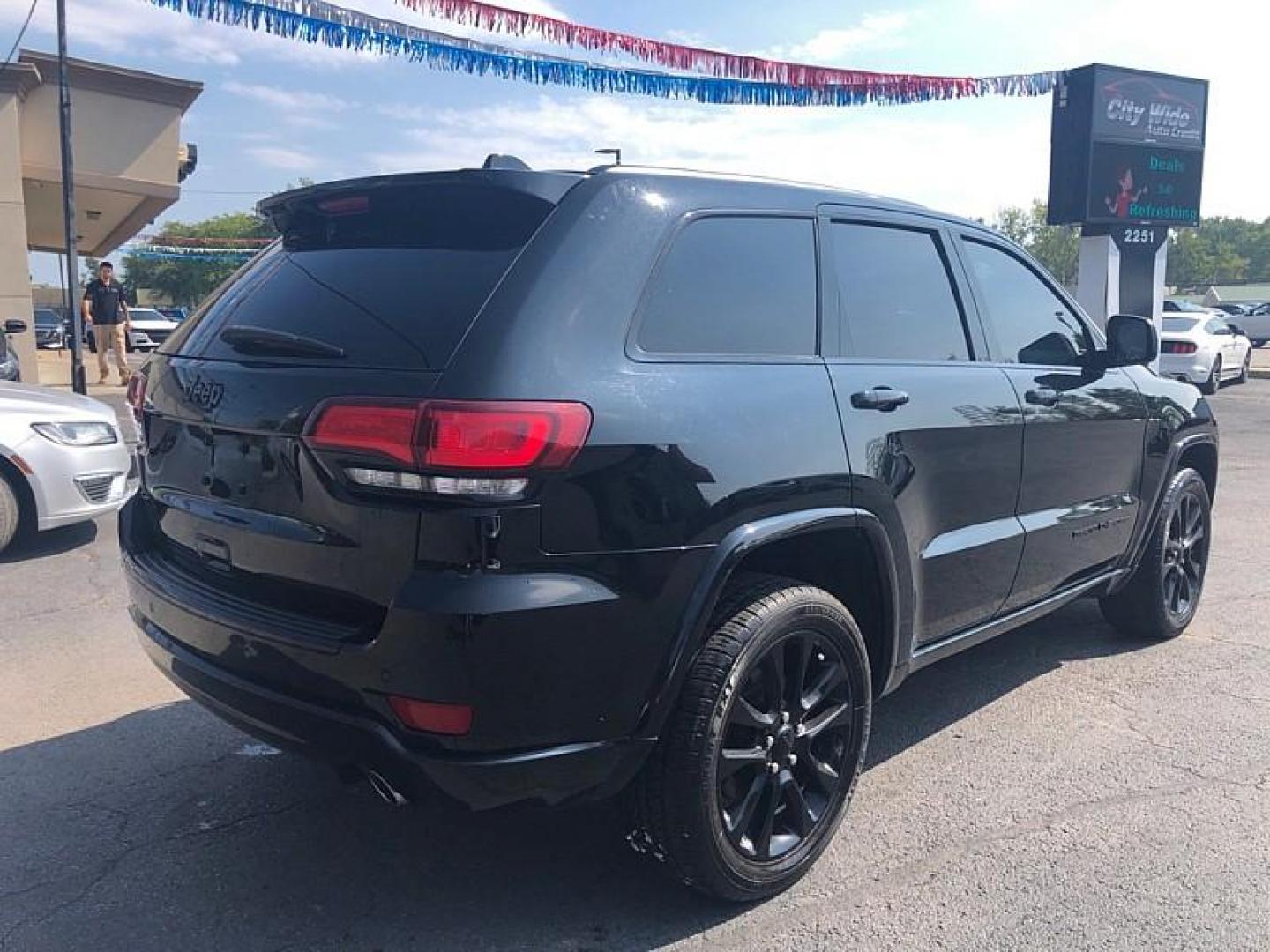 2018 BLACK /BLACK Jeep Grand Cherokee Laredo 4WD (1C4RJFAG8JC) with an 3.6L V6 DOHC 24V engine, 8A transmission, located at 3304 Woodville Road, Northwood, OH, 43619, (419) 210-8019, 41.612694, -83.480743 - Your #1 Destination for Auto Loans and mdash;No Matter Your Credit!At our dealership, we cater to everyone and mdash;whether you have good, bad, or no credit. With hundreds of vehicles to choose from, you can easily find the perfect car, truck, or SUV that fits your needs.Get Approved Today!Visit ou - Photo#4