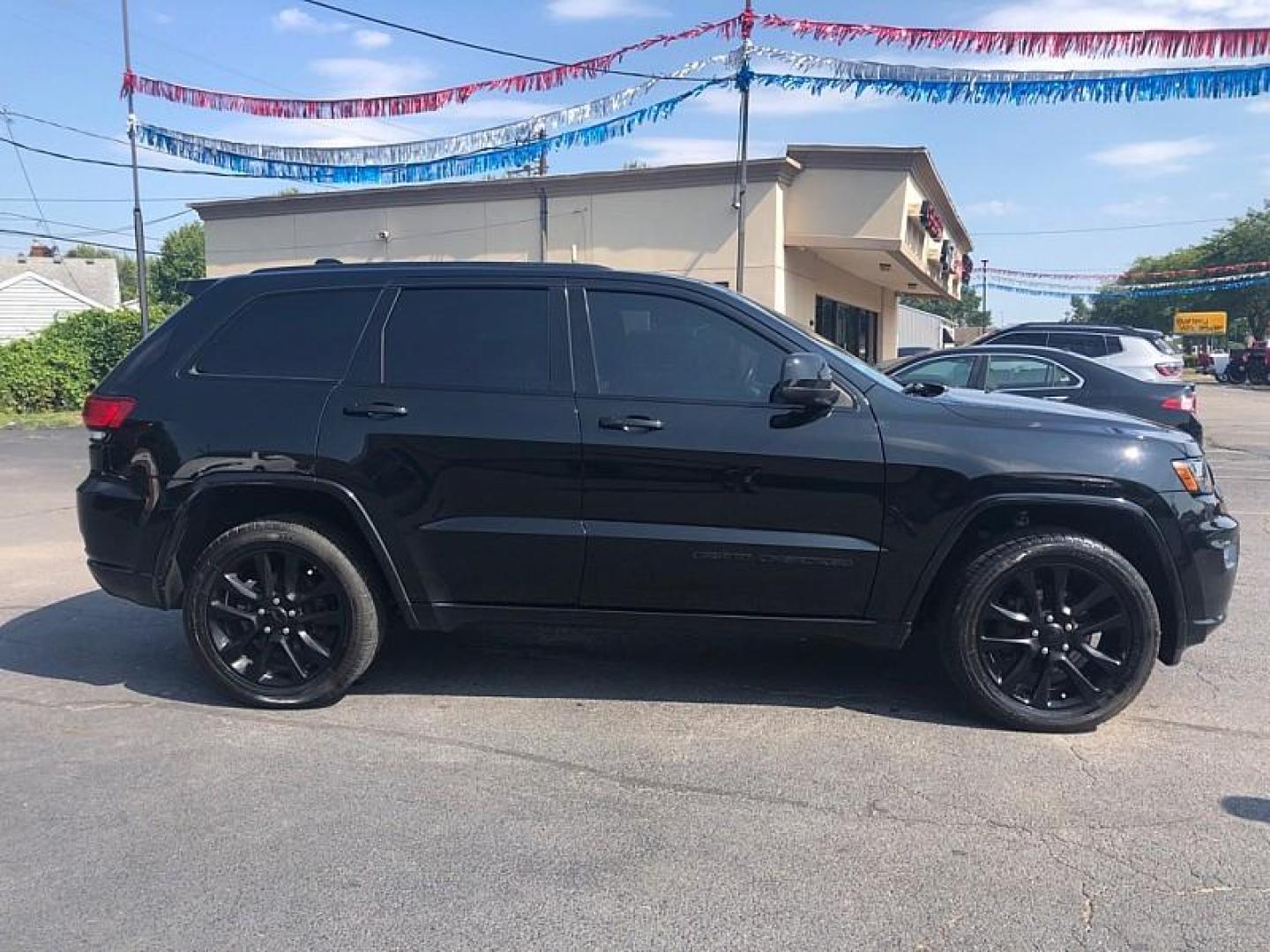 2018 BLACK /BLACK Jeep Grand Cherokee Laredo 4WD (1C4RJFAG8JC) with an 3.6L V6 DOHC 24V engine, 8A transmission, located at 3304 Woodville Road, Northwood, OH, 43619, (419) 210-8019, 41.612694, -83.480743 - Your #1 Destination for Auto Loans and mdash;No Matter Your Credit!At our dealership, we cater to everyone and mdash;whether you have good, bad, or no credit. With hundreds of vehicles to choose from, you can easily find the perfect car, truck, or SUV that fits your needs.Get Approved Today!Visit ou - Photo#5