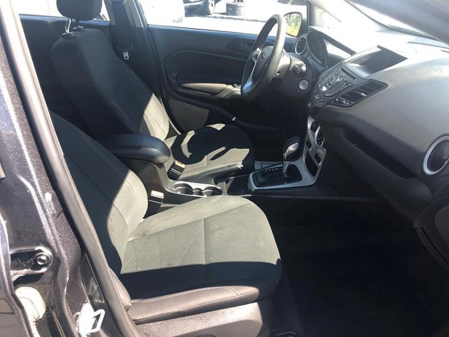 2019 GRAY /BLACK Ford Fiesta SE Sedan (3FADP4BJ8KM) with an 1.6L L4 DOHC 16V engine, Automatic 6-Spd PowerShift w/SelectShift transmission, located at 3304 Woodville Road, Northwood, OH, 43619, (419) 210-8019, 41.612694, -83.480743 - We are #1 Auto Loan Dealer for Good Bad or No Credit we have hundreds of vehicles to choose from, stop on in or just fill out our online application to get approved for auto financing and see your credit score for free by visiting our website today. We have Low Payment Options and Terms Available - Photo#16