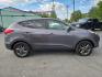 2014 GRAY /BLACK Hyundai Tucson GL Auto AWD (KM8JTCAF5EU) with an 2.0L L4 DOHC 16V engine, 6-Speed Automatic transmission, located at 3304 Woodville Road, Northwood, OH, 43619, (419) 210-8019, 41.612694, -83.480743 - We are #1 Auto Loan Dealer for Good Bad or No Credit we have hundreds of vehicles to choose from, stop on in or just fill out our online application to get approved for auto financing and see your credit score for free by visiting our website today. We have Low Payment Options and Terms Available - Photo#5