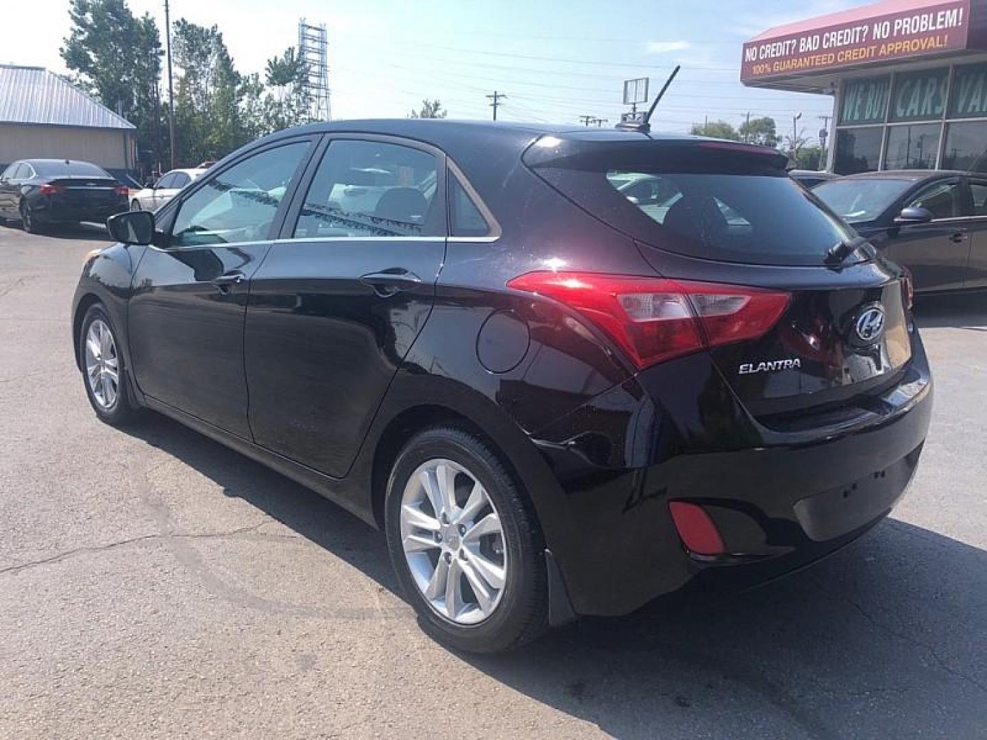 2014 BLACK /BLACKD Hyundai Elantra GT A/T (KMHD35LH6EU) with an 2.0L L4 16V DOHC engine, 6-Speed Automatic transmission, located at 3304 Woodville Road, Northwood, OH, 43619, (419) 210-8019, 41.612694, -83.480743 - We are #1 Auto Loan Dealer for Good Bad or No Credit we have hundreds of vehicles to choose from, stop on in or just fill out our online application to get approved for auto financing and see your credit score for free by visiting our website today. We have Low Payment Options and Terms Available - Photo#2