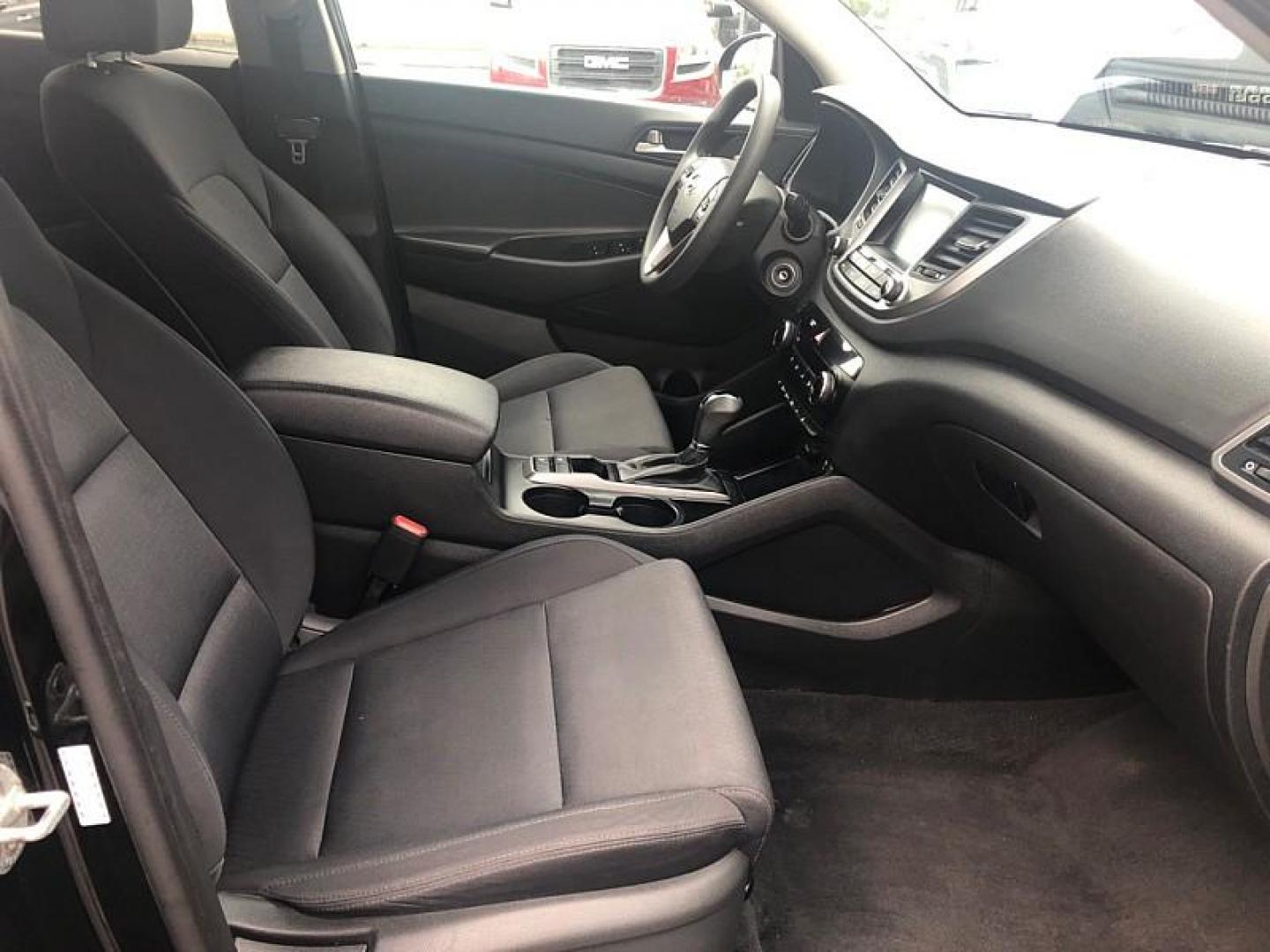 2018 BLACK /BLACK Hyundai Tucson SE (KM8J33A44JU) with an 2.0L L4 DOHC 16V engine, 6A transmission, located at 3304 Woodville Road, Northwood, OH, 43619, (419) 210-8019, 41.612694, -83.480743 - We are #1 Auto Loan Dealer for Good Bad or No Credit we have hundreds of vehicles to choose from, stop on in or just fill out our online application to get approved for auto financing and see your credit score for free by visiting our website today. We have Low Payment Options and Terms Available - Photo#16