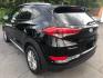 2018 BLACK /BLACK Hyundai Tucson SE (KM8J33A44JU) with an 2.0L L4 DOHC 16V engine, 6A transmission, located at 3304 Woodville Road, Northwood, OH, 43619, (419) 210-8019, 41.612694, -83.480743 - We are #1 Auto Loan Dealer for Good Bad or No Credit we have hundreds of vehicles to choose from, stop on in or just fill out our online application to get approved for auto financing and see your credit score for free by visiting our website today. We have Low Payment Options and Terms Available - Photo#2