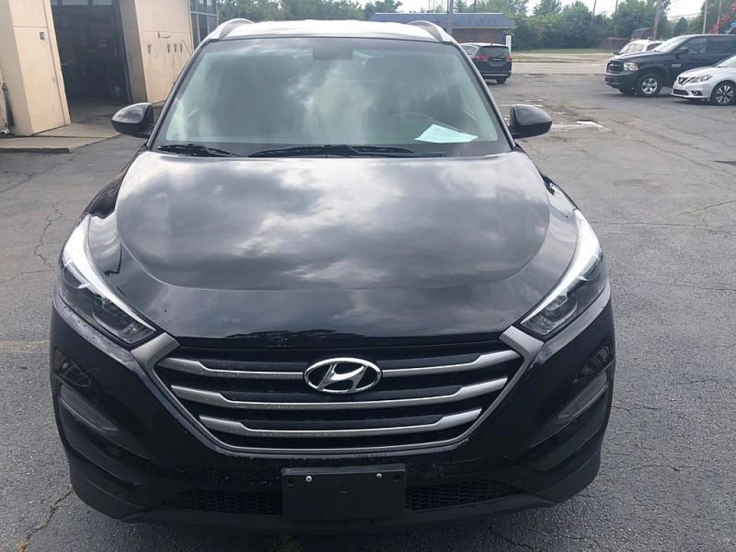 2018 BLACK /BLACK Hyundai Tucson SE (KM8J33A44JU) with an 2.0L L4 DOHC 16V engine, 6A transmission, located at 3304 Woodville Road, Northwood, OH, 43619, (419) 210-8019, 41.612694, -83.480743 - We are #1 Auto Loan Dealer for Good Bad or No Credit we have hundreds of vehicles to choose from, stop on in or just fill out our online application to get approved for auto financing and see your credit score for free by visiting our website today. We have Low Payment Options and Terms Available - Photo#7