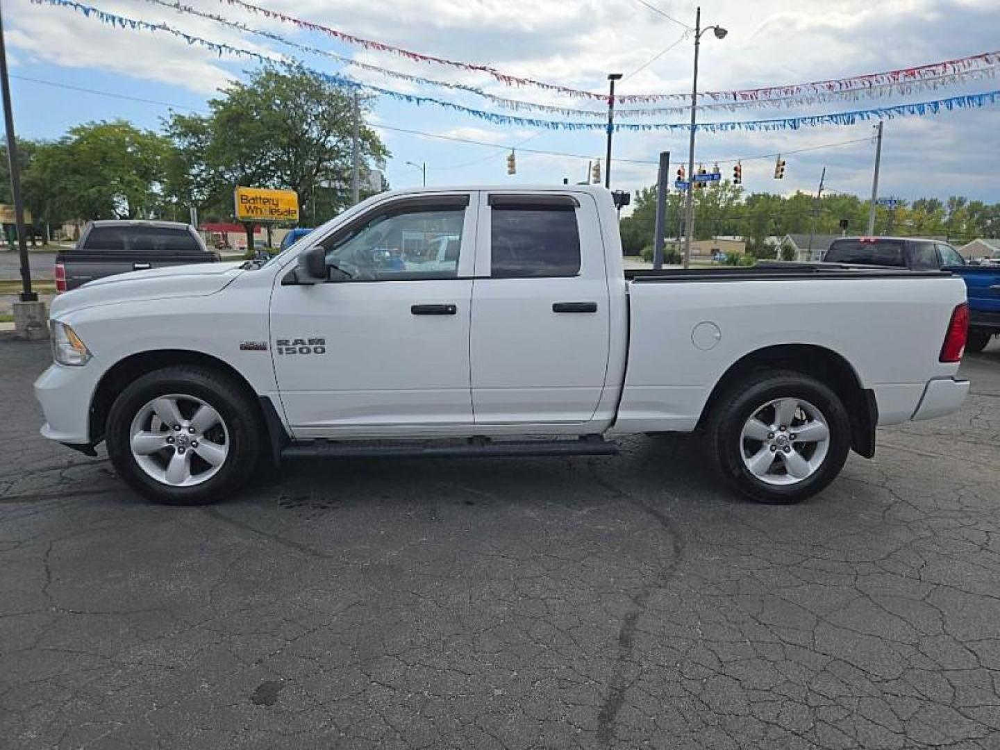 2015 WHITE /GREY RAM 1500 Tradesman Quad Cab 4WD (1C6RR7FT3FS) with an 5.7L V8 OHV 16V engine, 6-Speed Automatic transmission, located at 3304 Woodville Road, Northwood, OH, 43619, (419) 210-8019, 41.612694, -83.480743 - We are #1 Auto Loan Dealer for Good Bad or No Credit we have hundreds of vehicles to choose from, stop on in or just fill out our online application to get approved for auto financing and see your credit score for free by visiting our website today. We have Low Payment Options and Terms Available - Photo#1