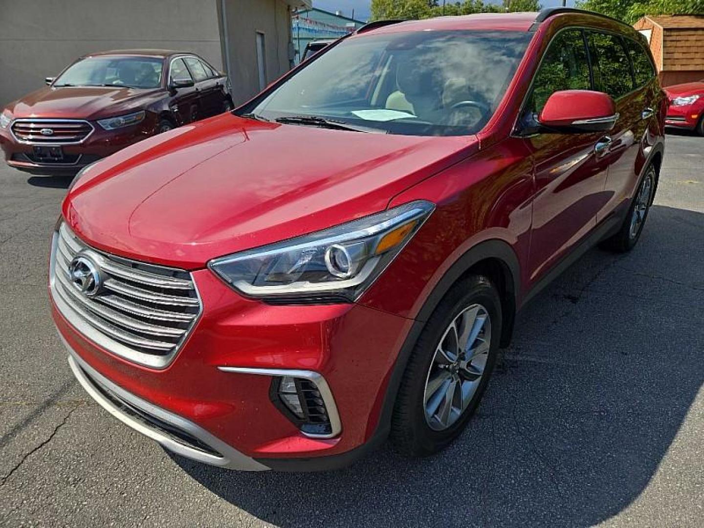 2017 RED /BLACK Hyundai Santa Fe Limited AWD (KM8SNDHF8HU) with an 3.3L V6 DOHC 24V engine, 6A transmission, located at 3304 Woodville Road, Northwood, OH, 43619, (419) 210-8019, 41.612694, -83.480743 - We are #1 Auto Loan Dealer for Good Bad or No Credit we have hundreds of vehicles to choose from, stop on in or just fill out our online application to get approved for auto financing and see your credit score for free by visiting our website today. We have Low Payment Options and Terms Available - Photo#0