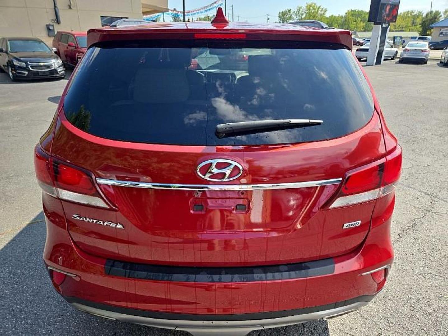 2017 RED /BLACK Hyundai Santa Fe Limited AWD (KM8SNDHF8HU) with an 3.3L V6 DOHC 24V engine, 6A transmission, located at 3304 Woodville Road, Northwood, OH, 43619, (419) 210-8019, 41.612694, -83.480743 - We are #1 Auto Loan Dealer for Good Bad or No Credit we have hundreds of vehicles to choose from, stop on in or just fill out our online application to get approved for auto financing and see your credit score for free by visiting our website today. We have Low Payment Options and Terms Available - Photo#1