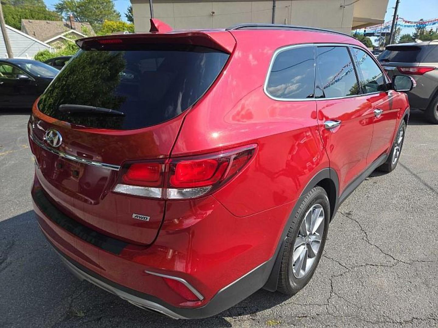 2017 RED /BLACK Hyundai Santa Fe Limited AWD (KM8SNDHF8HU) with an 3.3L V6 DOHC 24V engine, 6A transmission, located at 3304 Woodville Road, Northwood, OH, 43619, (419) 210-8019, 41.612694, -83.480743 - We are #1 Auto Loan Dealer for Good Bad or No Credit we have hundreds of vehicles to choose from, stop on in or just fill out our online application to get approved for auto financing and see your credit score for free by visiting our website today. We have Low Payment Options and Terms Available - Photo#2