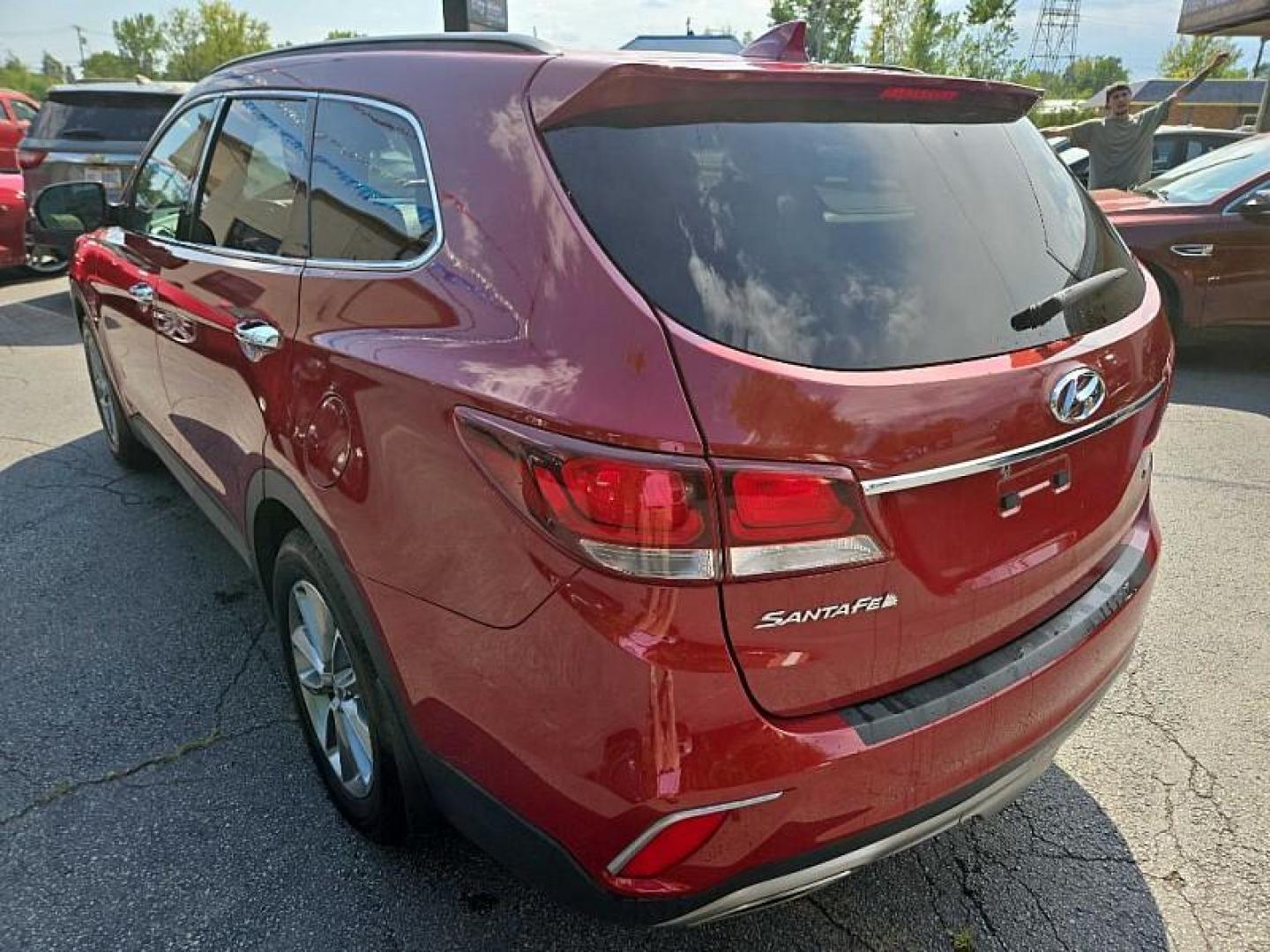 2017 RED /BLACK Hyundai Santa Fe Limited AWD (KM8SNDHF8HU) with an 3.3L V6 DOHC 24V engine, 6A transmission, located at 3304 Woodville Road, Northwood, OH, 43619, (419) 210-8019, 41.612694, -83.480743 - We are #1 Auto Loan Dealer for Good Bad or No Credit we have hundreds of vehicles to choose from, stop on in or just fill out our online application to get approved for auto financing and see your credit score for free by visiting our website today. We have Low Payment Options and Terms Available - Photo#3