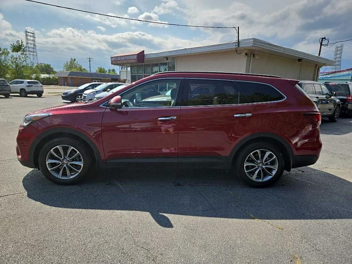 2017 RED /BLACK Hyundai Santa Fe Limited AWD (KM8SNDHF8HU) with an 3.3L V6 DOHC 24V engine, 6A transmission, located at 3304 Woodville Road, Northwood, OH, 43619, (419) 210-8019, 41.612694, -83.480743 - We are #1 Auto Loan Dealer for Good Bad or No Credit we have hundreds of vehicles to choose from, stop on in or just fill out our online application to get approved for auto financing and see your credit score for free by visiting our website today. We have Low Payment Options and Terms Available - Photo#4