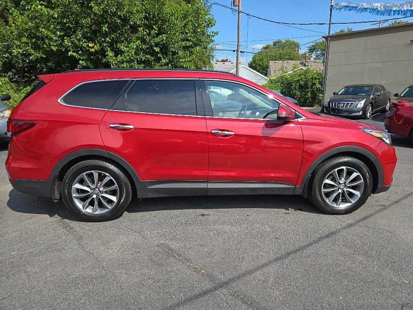 2017 RED /BLACK Hyundai Santa Fe Limited AWD (KM8SNDHF8HU) with an 3.3L V6 DOHC 24V engine, 6A transmission, located at 3304 Woodville Road, Northwood, OH, 43619, (419) 210-8019, 41.612694, -83.480743 - We are #1 Auto Loan Dealer for Good Bad or No Credit we have hundreds of vehicles to choose from, stop on in or just fill out our online application to get approved for auto financing and see your credit score for free by visiting our website today. We have Low Payment Options and Terms Available - Photo#7