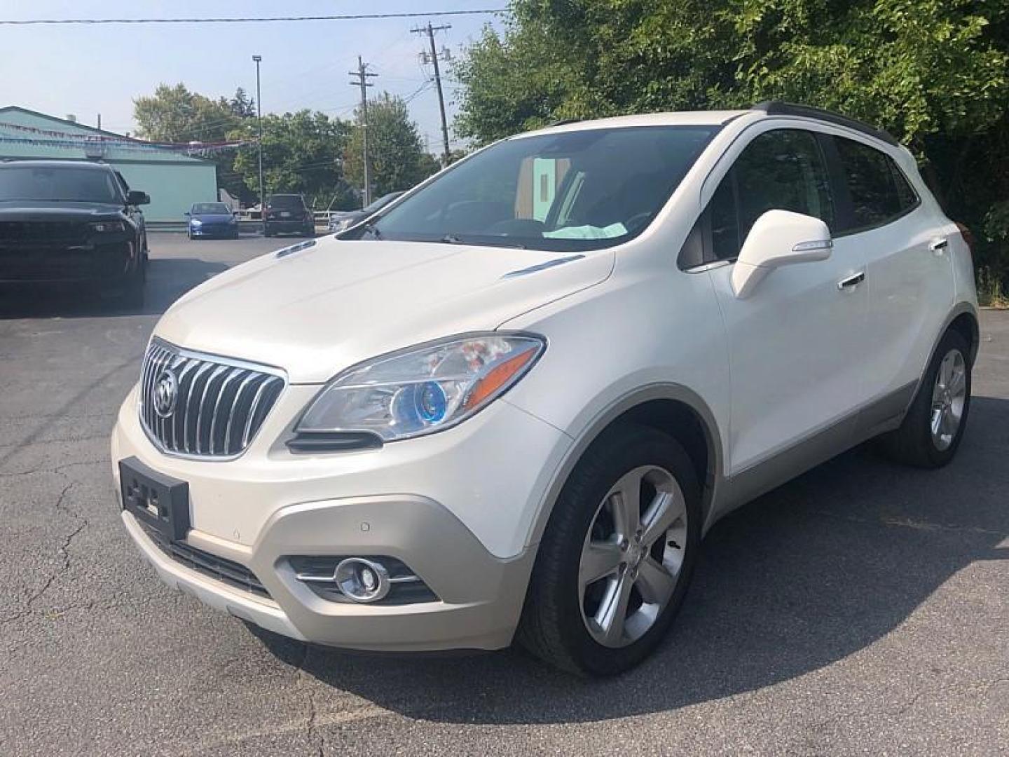 2016 WHITE /BLACK Buick Encore Premium AWD (KL4CJHSB7GB) with an 1.4L L4 DOHC 16V TURBO engine, 6A transmission, located at 3304 Woodville Road, Northwood, OH, 43619, (419) 210-8019, 41.612694, -83.480743 - We are #1 Auto Loan Dealer for Good Bad or No Credit we have hundreds of vehicles to choose from, stop on in or just fill out our online application to get approved for auto financing and see your credit score for free by visiting our website today. We have Low Payment Options and Terms Available - Photo#0