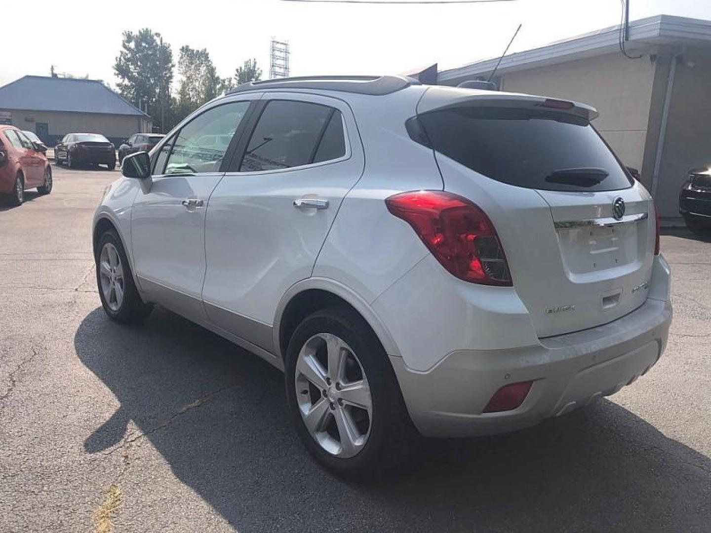 2016 WHITE /BLACK Buick Encore Premium AWD (KL4CJHSB7GB) with an 1.4L L4 DOHC 16V TURBO engine, 6A transmission, located at 3304 Woodville Road, Northwood, OH, 43619, (419) 210-8019, 41.612694, -83.480743 - We are #1 Auto Loan Dealer for Good Bad or No Credit we have hundreds of vehicles to choose from, stop on in or just fill out our online application to get approved for auto financing and see your credit score for free by visiting our website today. We have Low Payment Options and Terms Available - Photo#2