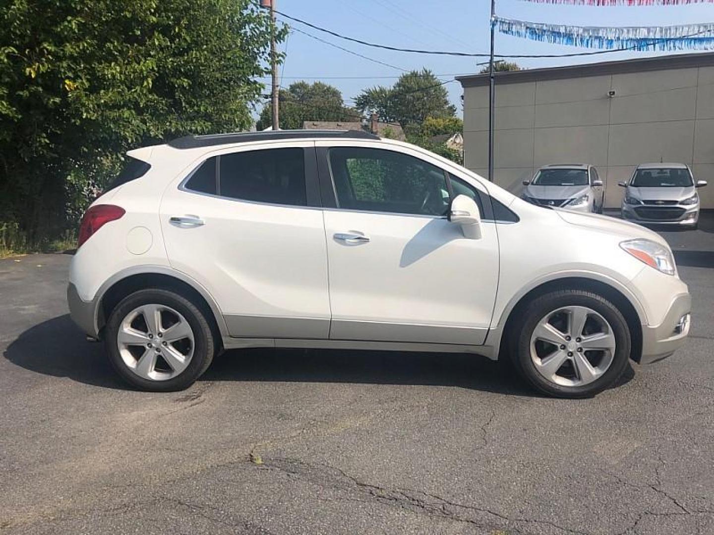 2016 WHITE /BLACK Buick Encore Premium AWD (KL4CJHSB7GB) with an 1.4L L4 DOHC 16V TURBO engine, 6A transmission, located at 3304 Woodville Road, Northwood, OH, 43619, (419) 210-8019, 41.612694, -83.480743 - We are #1 Auto Loan Dealer for Good Bad or No Credit we have hundreds of vehicles to choose from, stop on in or just fill out our online application to get approved for auto financing and see your credit score for free by visiting our website today. We have Low Payment Options and Terms Available - Photo#5