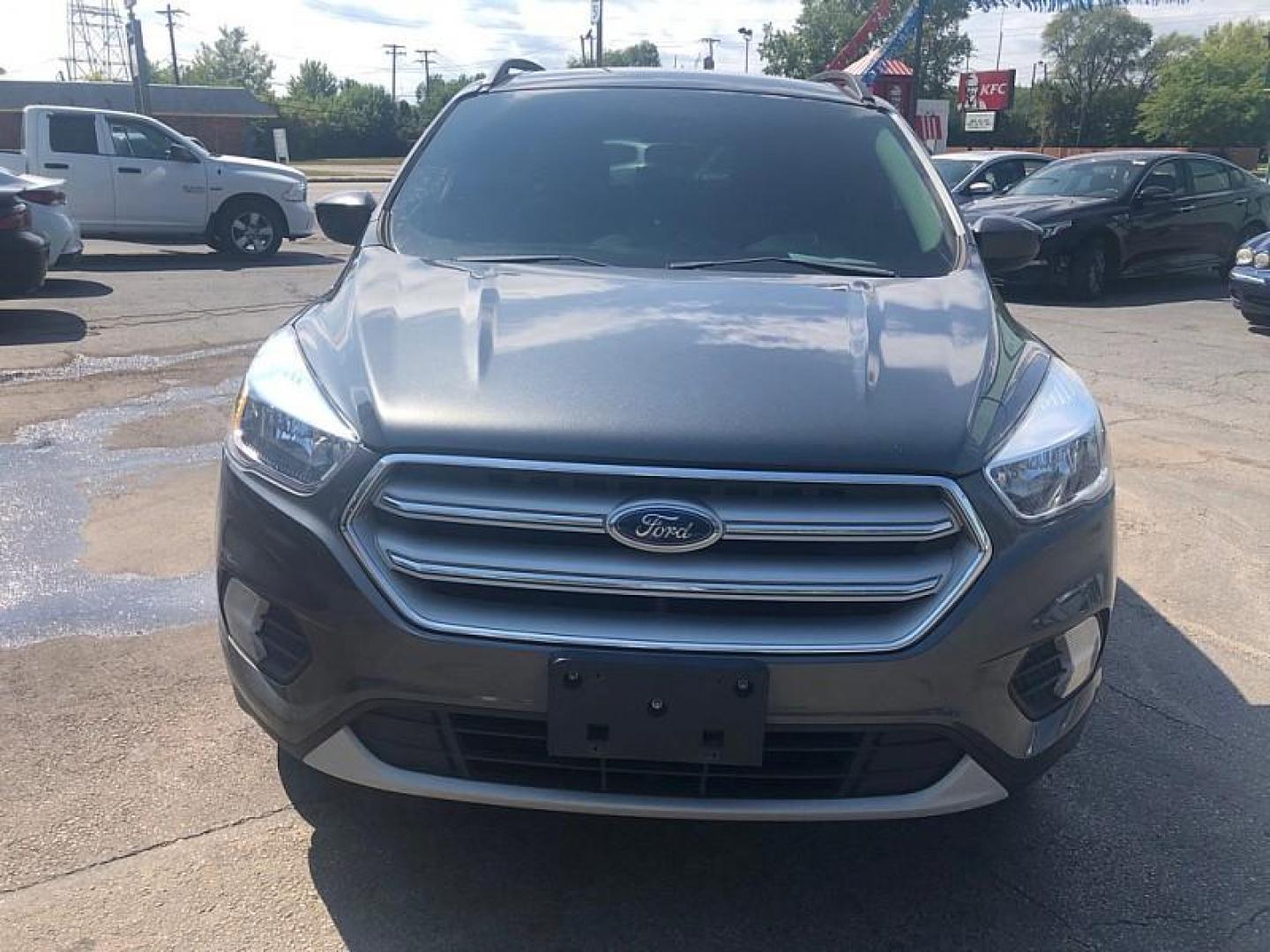 2018 GRAY /GREY Ford Escape SE 4WD (1FMCU9GD9JU) with an 1.5L L4 DOHC 16V engine, 6A transmission, located at 3304 Woodville Road, Northwood, OH, 43619, (419) 210-8019, 41.612694, -83.480743 - We are #1 Auto Loan Dealer for Good Bad or No Credit we have hundreds of vehicles to choose from, stop on in or just fill out our online application to get approved for auto financing and see your credit score for free by visiting our website today. We have Low Payment Options and Terms Available - Photo#7