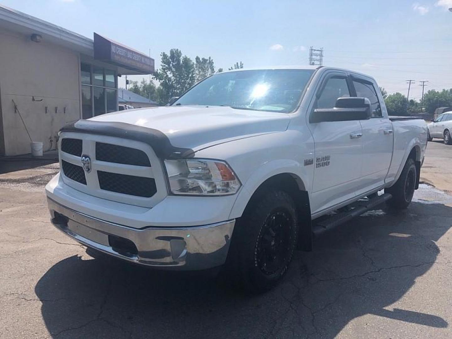 2014 WHITE /GREY RAM 1500 SLT Crew Cab LWB 4WD (1C6RR7TT6ES) with an 5.7L V8 OHV 16V engine, 6-Speed Automatic transmission, located at 3304 Woodville Road, Northwood, OH, 43619, (419) 210-8019, 41.612694, -83.480743 - We are #1 Auto Loan Dealer for Good Bad or No Credit we have hundreds of vehicles to choose from, stop on in or just fill out our online application to get approved for auto financing and see your credit score for free by visiting our website today. We have Low Payment Options and Terms Available - Photo#0