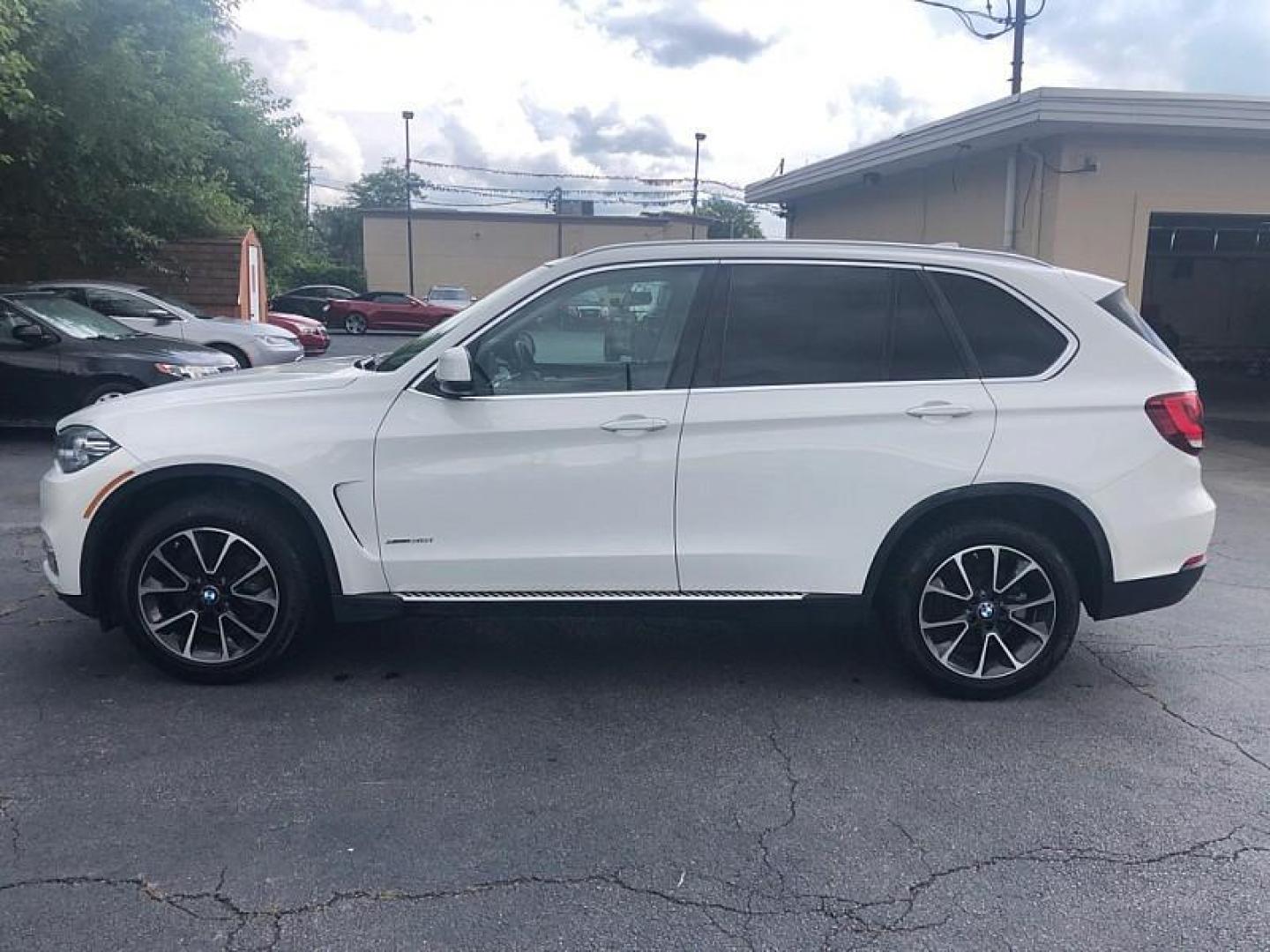 2015 WHITE /BROWN BMW X5 xDrive35i (5UXKR0C54F0) with an 3.0L L6 DOHC 24V engine, 8-Speed Automatic transmission, located at 3304 Woodville Road, Northwood, OH, 43619, (419) 210-8019, 41.612694, -83.480743 - We are #1 Auto Loan Dealer for Good Bad or No Credit we have hundreds of vehicles to choose from, stop on in or just fill out our online application to get approved for auto financing and see your credit score for free by visiting our website today. We have Low Payment Options and Terms Available - Photo#1