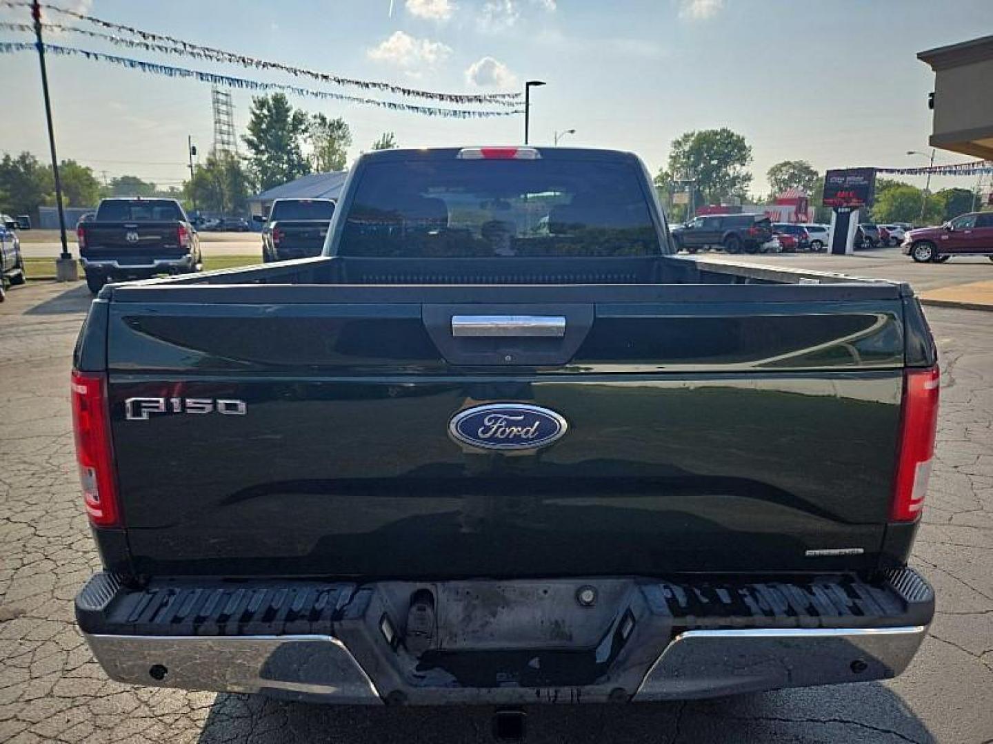 2015 GREEN /GREY Ford F-150 XL SuperCrew 6.5-ft. Bed 4WD (1FTFW1EF1FF) with an 5.0L V8 engine, 6-Speed Automatic transmission, located at 3304 Woodville Road, Northwood, OH, 43619, (419) 210-8019, 41.612694, -83.480743 - We are #1 Auto Loan Dealer for Good Bad or No Credit we have hundreds of vehicles to choose from, stop on in or just fill out our online application to get approved for auto financing and see your credit score for free by visiting our website today. We have Low Payment Options and Terms Available - Photo#3