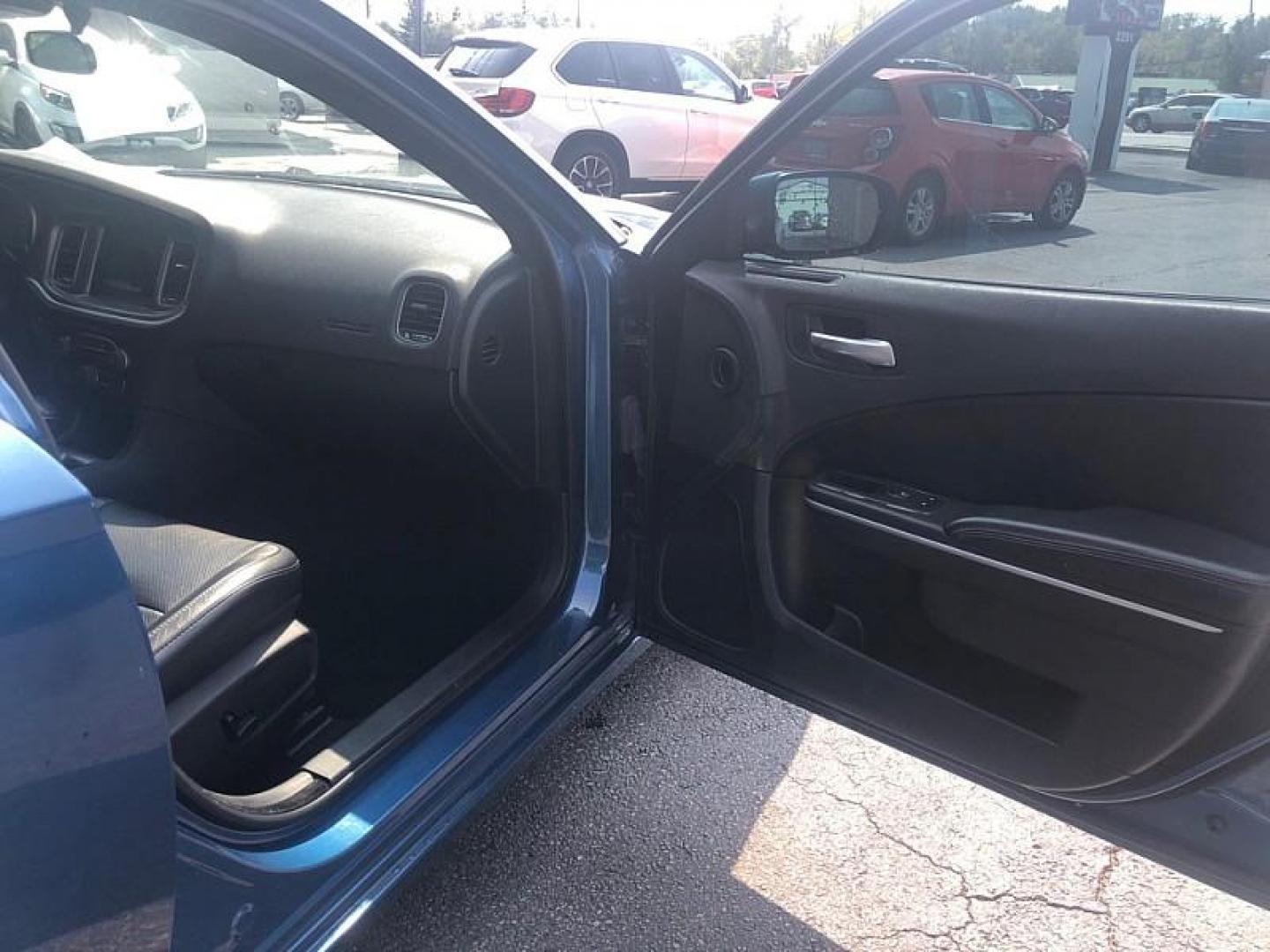 2021 BLUE /BLACK Dodge Charger SXT (2C3CDXBG1MH) with an 3.6L V6 DOHC 24V engine, 8A transmission, located at 3304 Woodville Road, Northwood, OH, 43619, (419) 210-8019, 41.612694, -83.480743 - We are #1 Auto Loan Dealer for Good Bad or No Credit we have hundreds of vehicles to choose from, stop on in or just fill out our online application to get approved for auto financing and see your credit score for free by visiting our website today. We have Low Payment Options and Terms Available - Photo#15