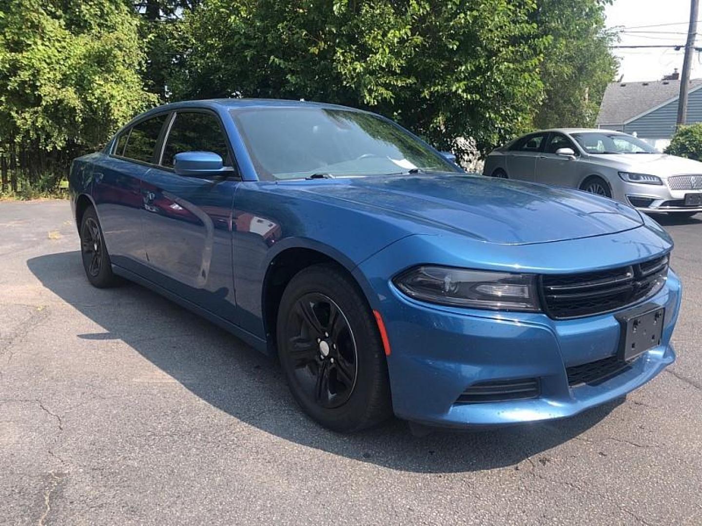 2021 BLUE /BLACK Dodge Charger SXT (2C3CDXBG1MH) with an 3.6L V6 DOHC 24V engine, 8A transmission, located at 3304 Woodville Road, Northwood, OH, 43619, (419) 210-8019, 41.612694, -83.480743 - We are #1 Auto Loan Dealer for Good Bad or No Credit we have hundreds of vehicles to choose from, stop on in or just fill out our online application to get approved for auto financing and see your credit score for free by visiting our website today. We have Low Payment Options and Terms Available - Photo#6