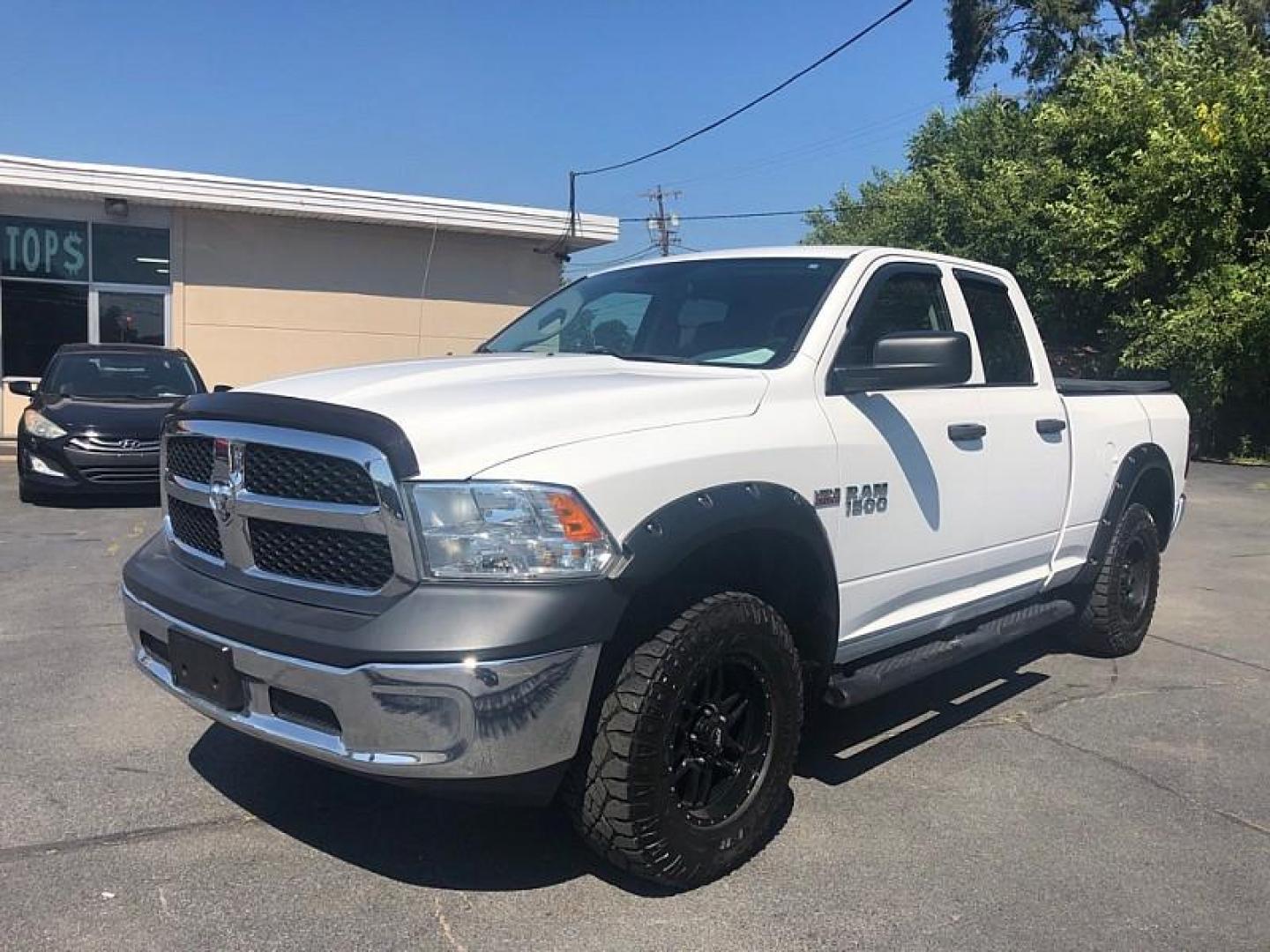 2017 WHITE /GREY RAM 1500 Tradesman Quad Cab 4WD (1C6RR7FT1HS) with an 5.7L V8 OHV 16V engine, 8A transmission, located at 3304 Woodville Road, Northwood, OH, 43619, (419) 210-8019, 41.612694, -83.480743 - We are #1 Auto Loan Dealer for Good Bad or No Credit we have hundreds of vehicles to choose from, stop on in or just fill out our online application to get approved for auto financing and see your credit score for free by visiting our website today. We have Low Payment Options and Terms Available - Photo#0