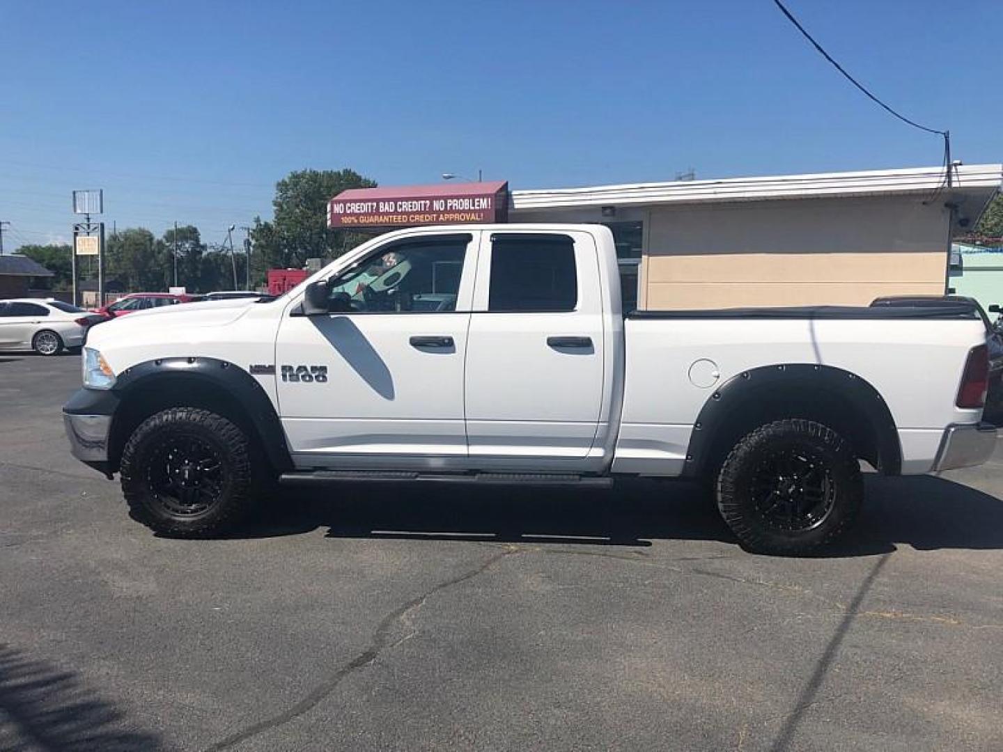 2017 WHITE /GREY RAM 1500 Tradesman Quad Cab 4WD (1C6RR7FT1HS) with an 5.7L V8 OHV 16V engine, 8A transmission, located at 3304 Woodville Road, Northwood, OH, 43619, (419) 210-8019, 41.612694, -83.480743 - We are #1 Auto Loan Dealer for Good Bad or No Credit we have hundreds of vehicles to choose from, stop on in or just fill out our online application to get approved for auto financing and see your credit score for free by visiting our website today. We have Low Payment Options and Terms Available - Photo#1