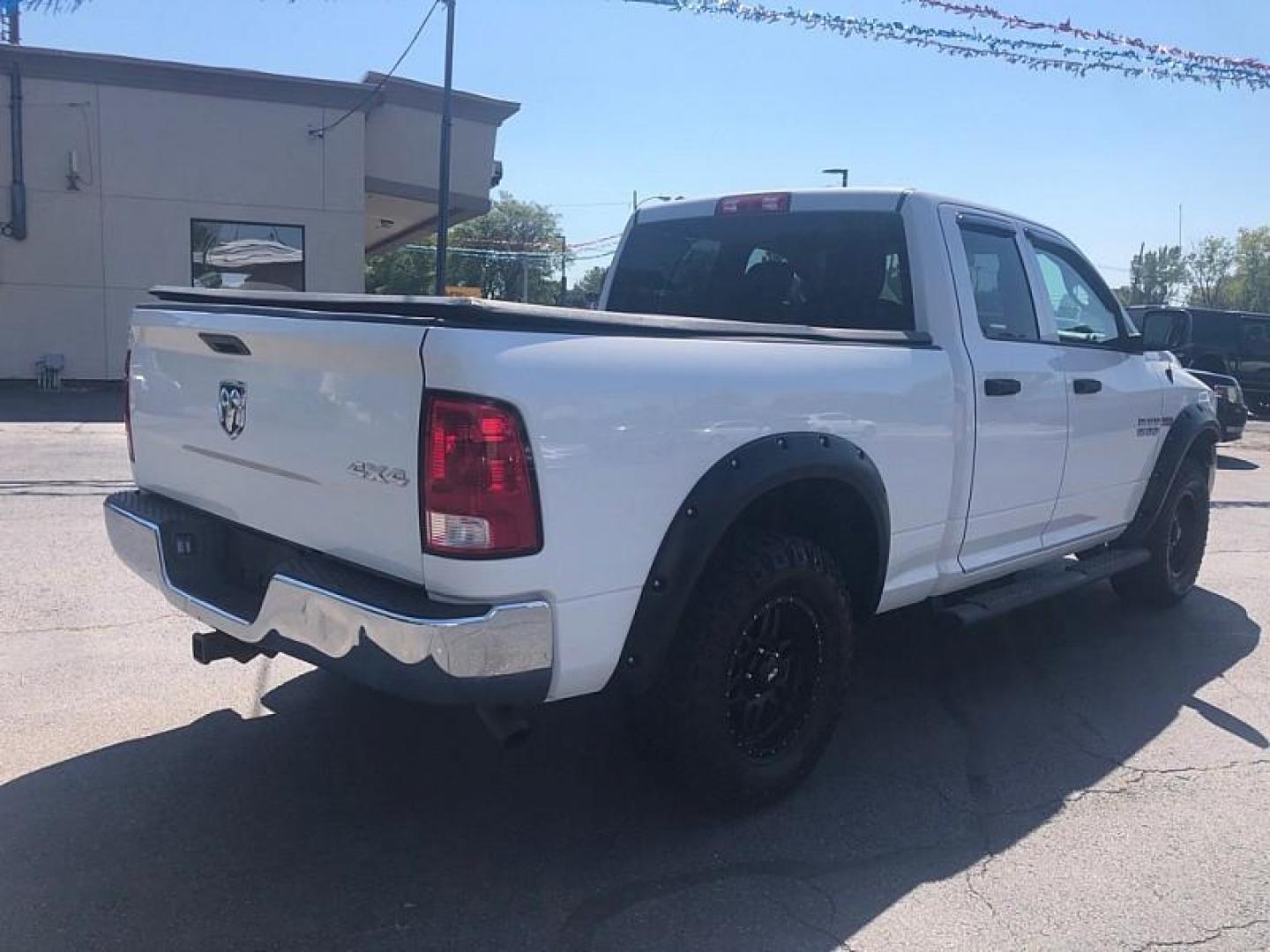 2017 WHITE /GREY RAM 1500 Tradesman Quad Cab 4WD (1C6RR7FT1HS) with an 5.7L V8 OHV 16V engine, 8A transmission, located at 3304 Woodville Road, Northwood, OH, 43619, (419) 210-8019, 41.612694, -83.480743 - We are #1 Auto Loan Dealer for Good Bad or No Credit we have hundreds of vehicles to choose from, stop on in or just fill out our online application to get approved for auto financing and see your credit score for free by visiting our website today. We have Low Payment Options and Terms Available - Photo#4