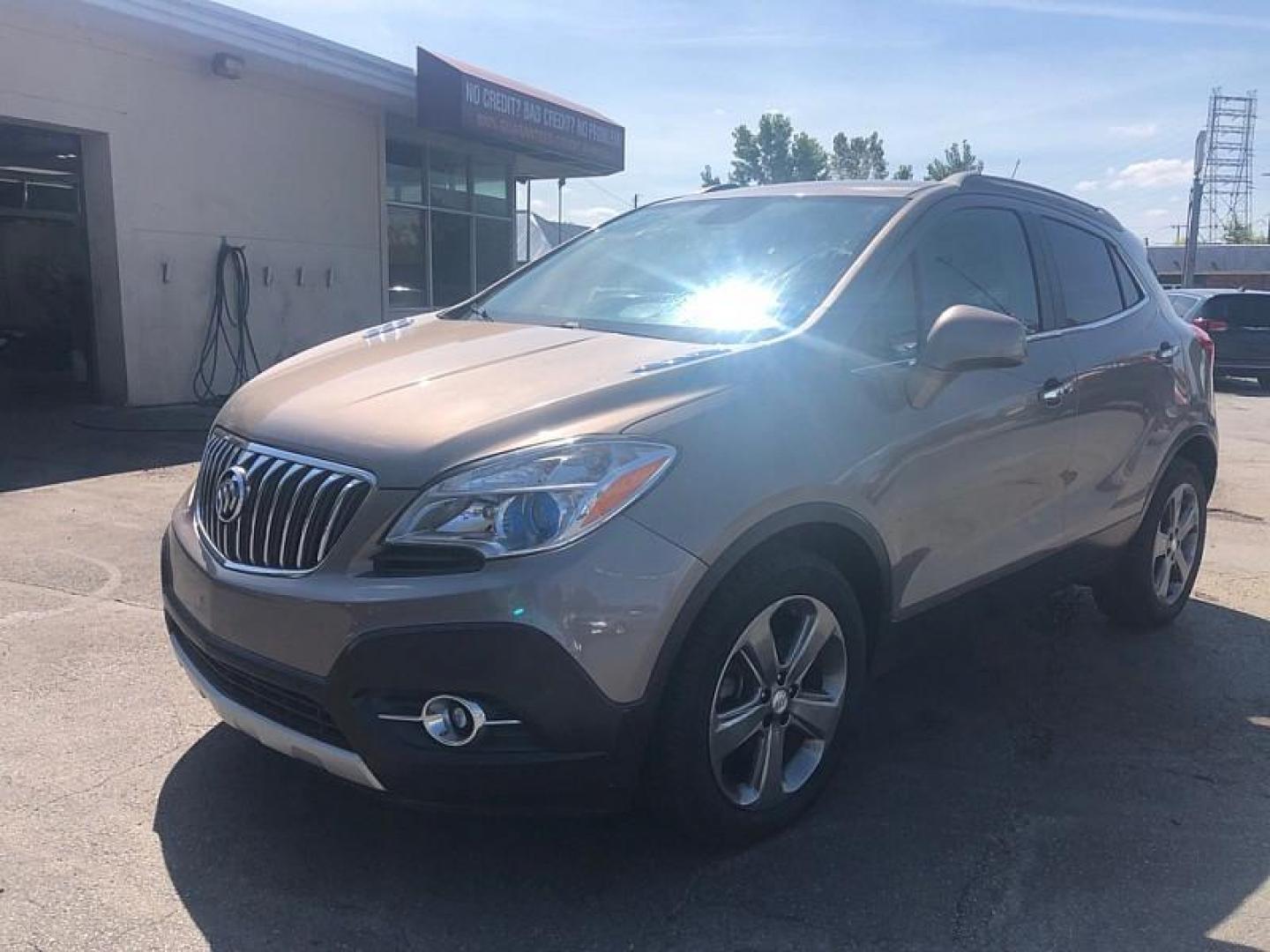 2013 BROWN /BLACK Buick Encore Convenience FWD (KL4CJBSB8DB) with an 1.4L L4 DOHC 16V TURBO engine, 6-Speed Automatic transmission, located at 3304 Woodville Road, Northwood, OH, 43619, (419) 210-8019, 41.612694, -83.480743 - We are #1 Auto Loan Dealer for Good Bad or No Credit we have hundreds of vehicles to choose from, stop on in or just fill out our online application to get approved for auto financing and see your credit score for free by visiting our website today. We have Low Payment Options and Terms Available - Photo#0