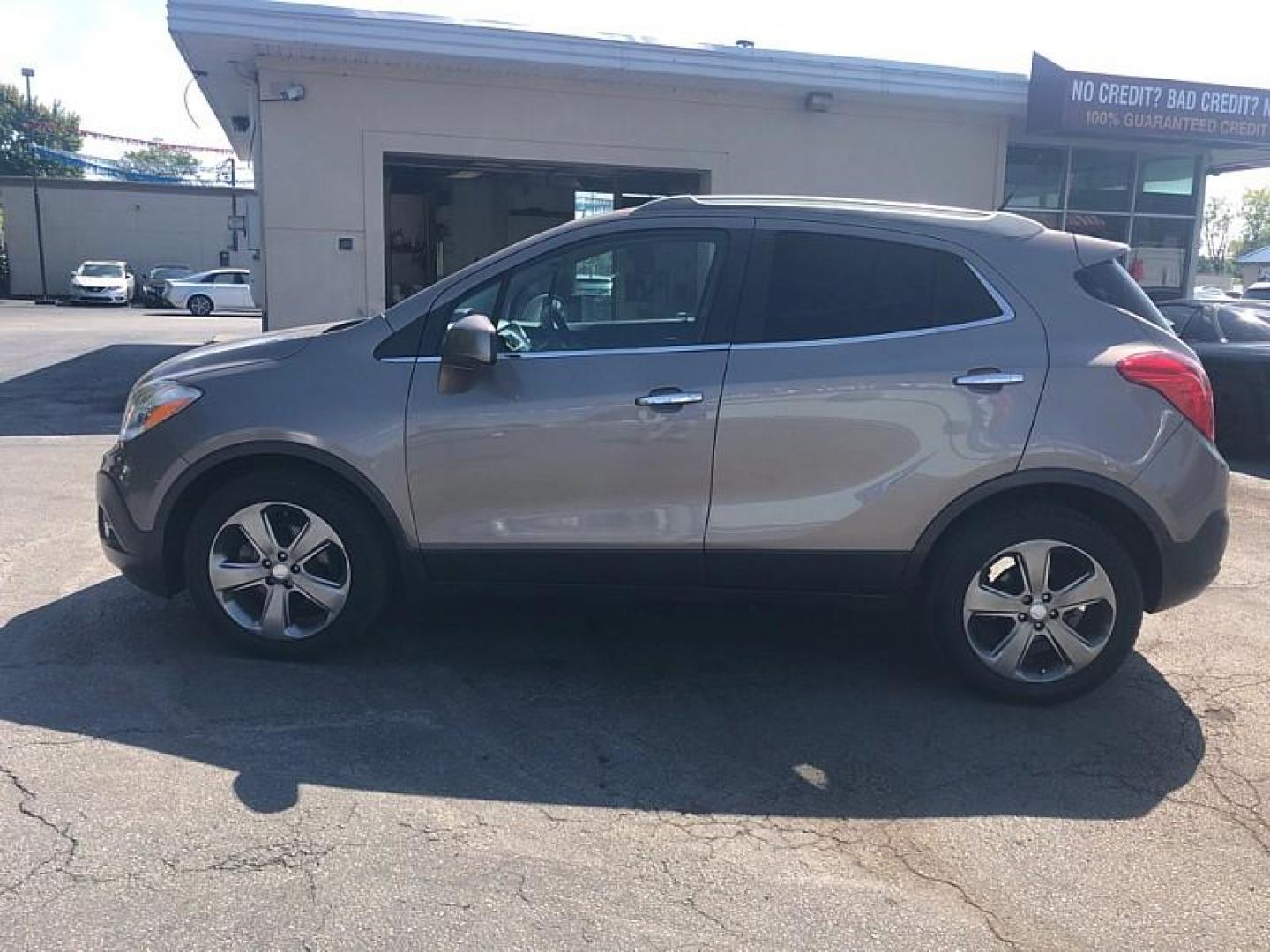 2013 BROWN /BLACK Buick Encore Convenience FWD (KL4CJBSB8DB) with an 1.4L L4 DOHC 16V TURBO engine, 6-Speed Automatic transmission, located at 3304 Woodville Road, Northwood, OH, 43619, (419) 210-8019, 41.612694, -83.480743 - We are #1 Auto Loan Dealer for Good Bad or No Credit we have hundreds of vehicles to choose from, stop on in or just fill out our online application to get approved for auto financing and see your credit score for free by visiting our website today. We have Low Payment Options and Terms Available - Photo#1