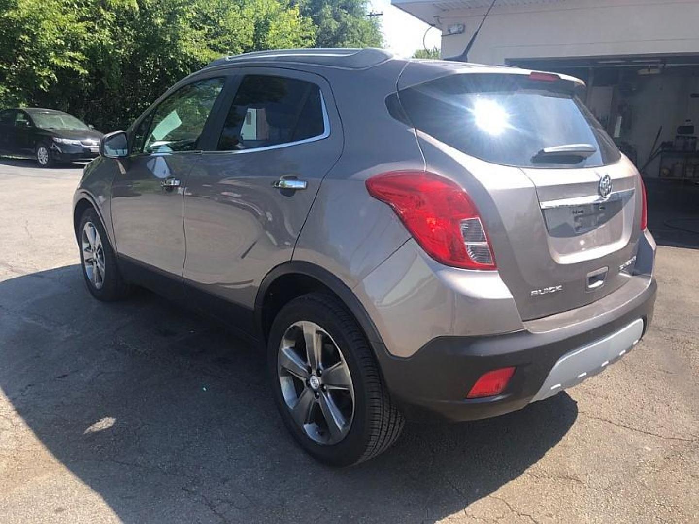 2013 BROWN /BLACK Buick Encore Convenience FWD (KL4CJBSB8DB) with an 1.4L L4 DOHC 16V TURBO engine, 6-Speed Automatic transmission, located at 3304 Woodville Road, Northwood, OH, 43619, (419) 210-8019, 41.612694, -83.480743 - We are #1 Auto Loan Dealer for Good Bad or No Credit we have hundreds of vehicles to choose from, stop on in or just fill out our online application to get approved for auto financing and see your credit score for free by visiting our website today. We have Low Payment Options and Terms Available - Photo#2