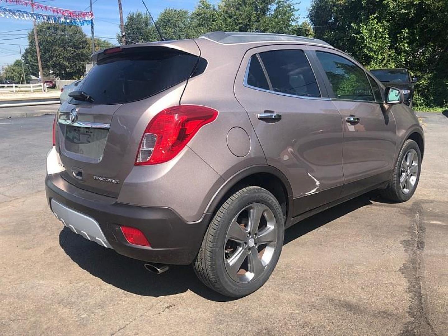 2013 BROWN /BLACK Buick Encore Convenience FWD (KL4CJBSB8DB) with an 1.4L L4 DOHC 16V TURBO engine, 6-Speed Automatic transmission, located at 3304 Woodville Road, Northwood, OH, 43619, (419) 210-8019, 41.612694, -83.480743 - We are #1 Auto Loan Dealer for Good Bad or No Credit we have hundreds of vehicles to choose from, stop on in or just fill out our online application to get approved for auto financing and see your credit score for free by visiting our website today. We have Low Payment Options and Terms Available - Photo#4