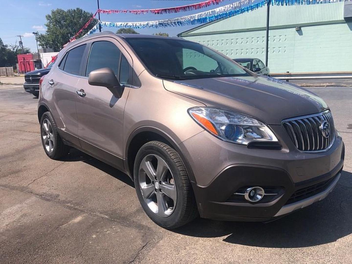 2013 BROWN /BLACK Buick Encore Convenience FWD (KL4CJBSB8DB) with an 1.4L L4 DOHC 16V TURBO engine, 6-Speed Automatic transmission, located at 3304 Woodville Road, Northwood, OH, 43619, (419) 210-8019, 41.612694, -83.480743 - We are #1 Auto Loan Dealer for Good Bad or No Credit we have hundreds of vehicles to choose from, stop on in or just fill out our online application to get approved for auto financing and see your credit score for free by visiting our website today. We have Low Payment Options and Terms Available - Photo#6