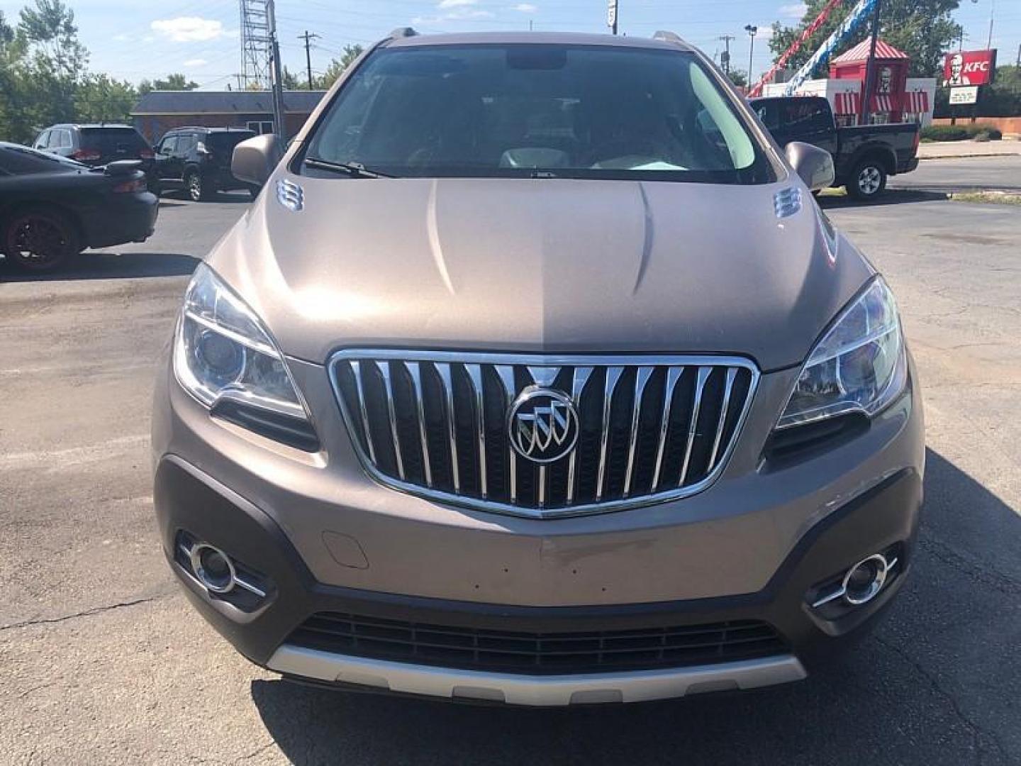 2013 BROWN /BLACK Buick Encore Convenience FWD (KL4CJBSB8DB) with an 1.4L L4 DOHC 16V TURBO engine, 6-Speed Automatic transmission, located at 3304 Woodville Road, Northwood, OH, 43619, (419) 210-8019, 41.612694, -83.480743 - We are #1 Auto Loan Dealer for Good Bad or No Credit we have hundreds of vehicles to choose from, stop on in or just fill out our online application to get approved for auto financing and see your credit score for free by visiting our website today. We have Low Payment Options and Terms Available - Photo#7