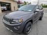 2015 GRAY /BLACK Jeep Grand Cherokee Overland 4WD (1C4RJFCGXFC) with an 3.6L V6 DOHC 24V engine, 8-Speed Automatic transmission, located at 3304 Woodville Road, Northwood, OH, 43619, (419) 210-8019, 41.612694, -83.480743 - We are #1 Auto Loan Dealer for Good Bad or No Credit we have hundreds of vehicles to choose from, stop on in or just fill out our online application to get approved for auto financing and see your credit score for free by visiting our website today. We have Low Payment Options and Terms Available - Photo#0