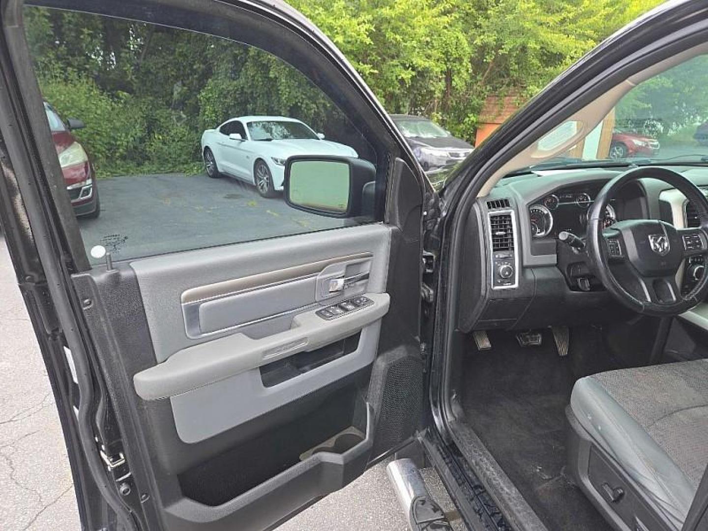 2015 BLACK /GRAY RAM 1500 SLT Crew Cab SWB 4WD (1C6RR7LG9FS) with an 3.6L V6 DOHC 24V FFV engine, 6-Speed Automatic transmission, located at 3304 Woodville Road, Northwood, OH, 43619, (419) 210-8019, 41.612694, -83.480743 - We are #1 Auto Loan Dealer for Good Bad or No Credit we have hundreds of vehicles to choose from, stop on in or just fill out our online application to get approved for auto financing and see your credit score for free by visiting our website today. We have Low Payment Options and Terms Available - Photo#8