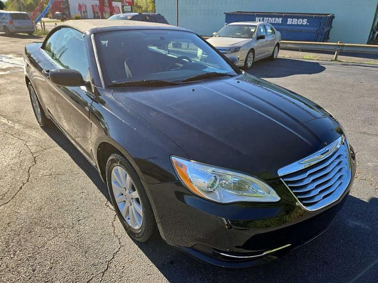 2013 BLACK /BLACK Chrysler 200 Touring Convertible (1C3BCBEB2DN) with an 2.4L L4 DOHC 16V engine, 6-Speed Automatic transmission, located at 3304 Woodville Road, Northwood, OH, 43619, (419) 210-8019, 41.612694, -83.480743 - We are #1 Auto Loan Dealer for Good Bad or No Credit we have hundreds of vehicles to choose from, stop on in or just fill out our online application to get approved for auto financing and see your credit score for free by visiting our website today. We have Low Payment Options and Terms Available - Photo#6