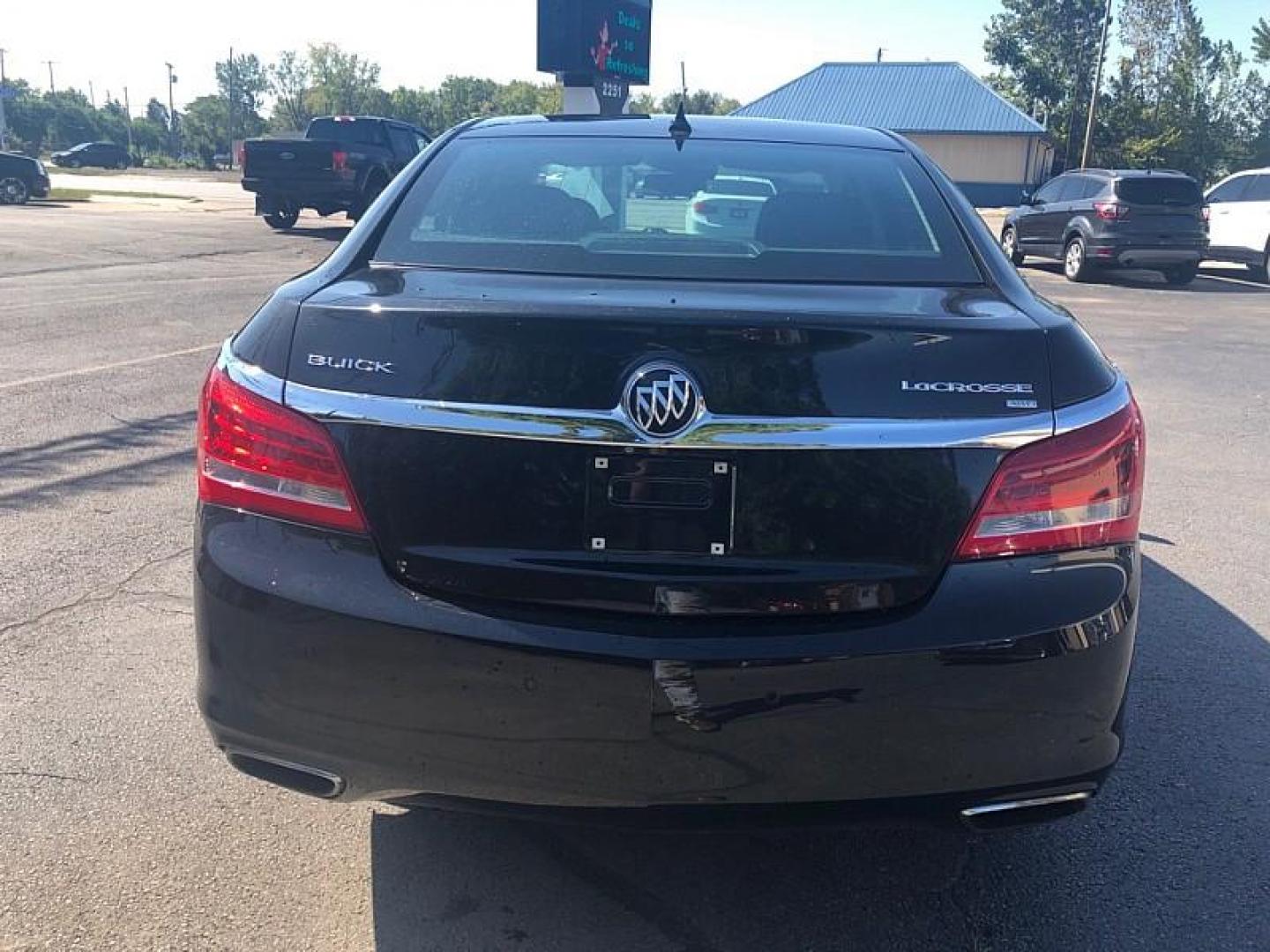 2014 BLACK /BLACK Buick LaCrosse Premium Package 1, w/Leather AWD (1G4GE5G39EF) with an 3.6L V6 DOHC 24V FFV engine, 6-Speed Automatic transmission, located at 3304 Woodville Road, Northwood, OH, 43619, (419) 210-8019, 41.612694, -83.480743 - We are #1 Auto Loan Dealer for Good Bad or No Credit we have hundreds of vehicles to choose from, stop on in or just fill out our online application to get approved for auto financing and see your credit score for free by visiting our website today. We have Low Payment Options and Terms Available - Photo#3