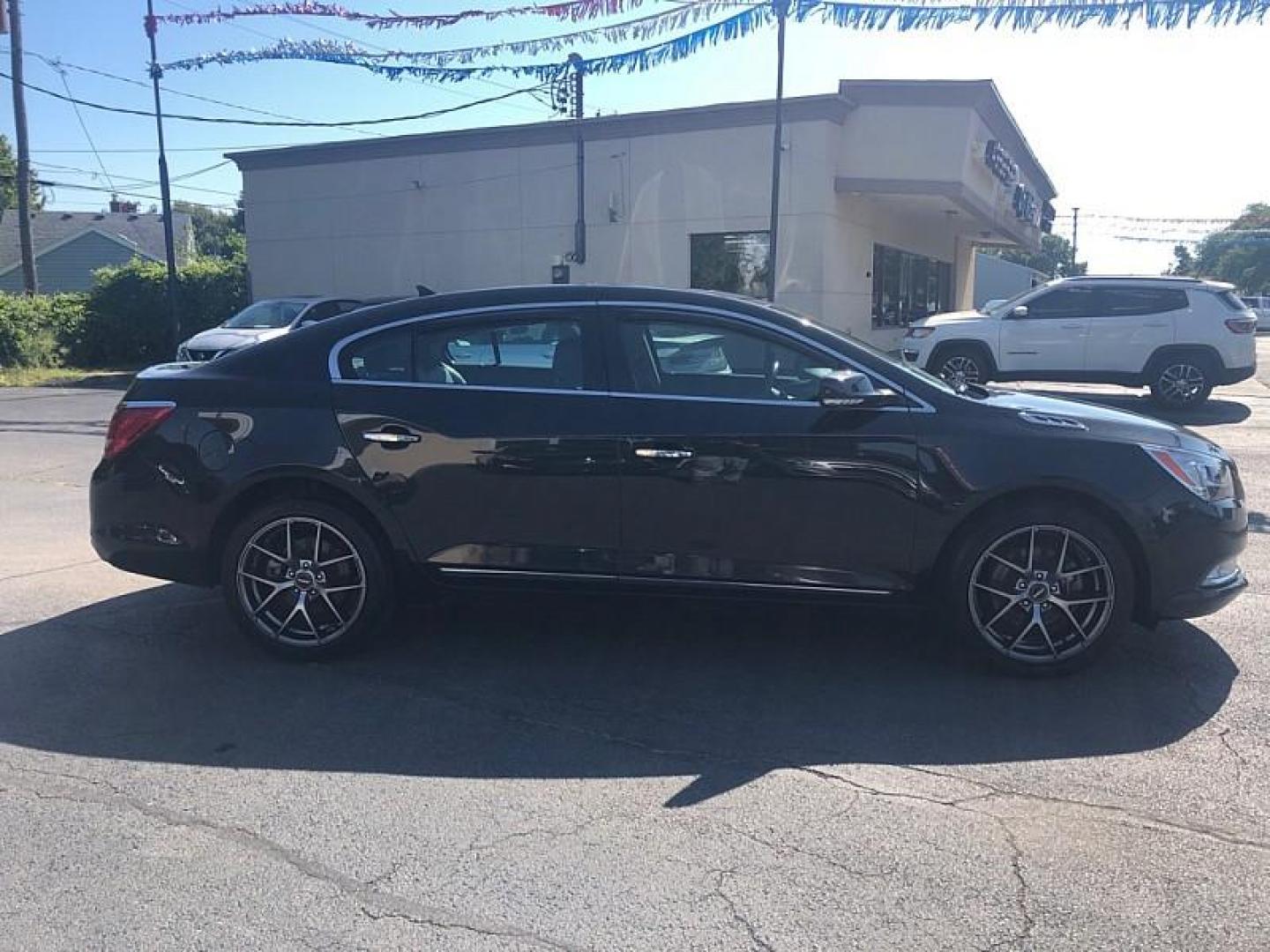 2014 BLACK /BLACK Buick LaCrosse Premium Package 1, w/Leather AWD (1G4GE5G39EF) with an 3.6L V6 DOHC 24V FFV engine, 6-Speed Automatic transmission, located at 3304 Woodville Road, Northwood, OH, 43619, (419) 210-8019, 41.612694, -83.480743 - We are #1 Auto Loan Dealer for Good Bad or No Credit we have hundreds of vehicles to choose from, stop on in or just fill out our online application to get approved for auto financing and see your credit score for free by visiting our website today. We have Low Payment Options and Terms Available - Photo#5