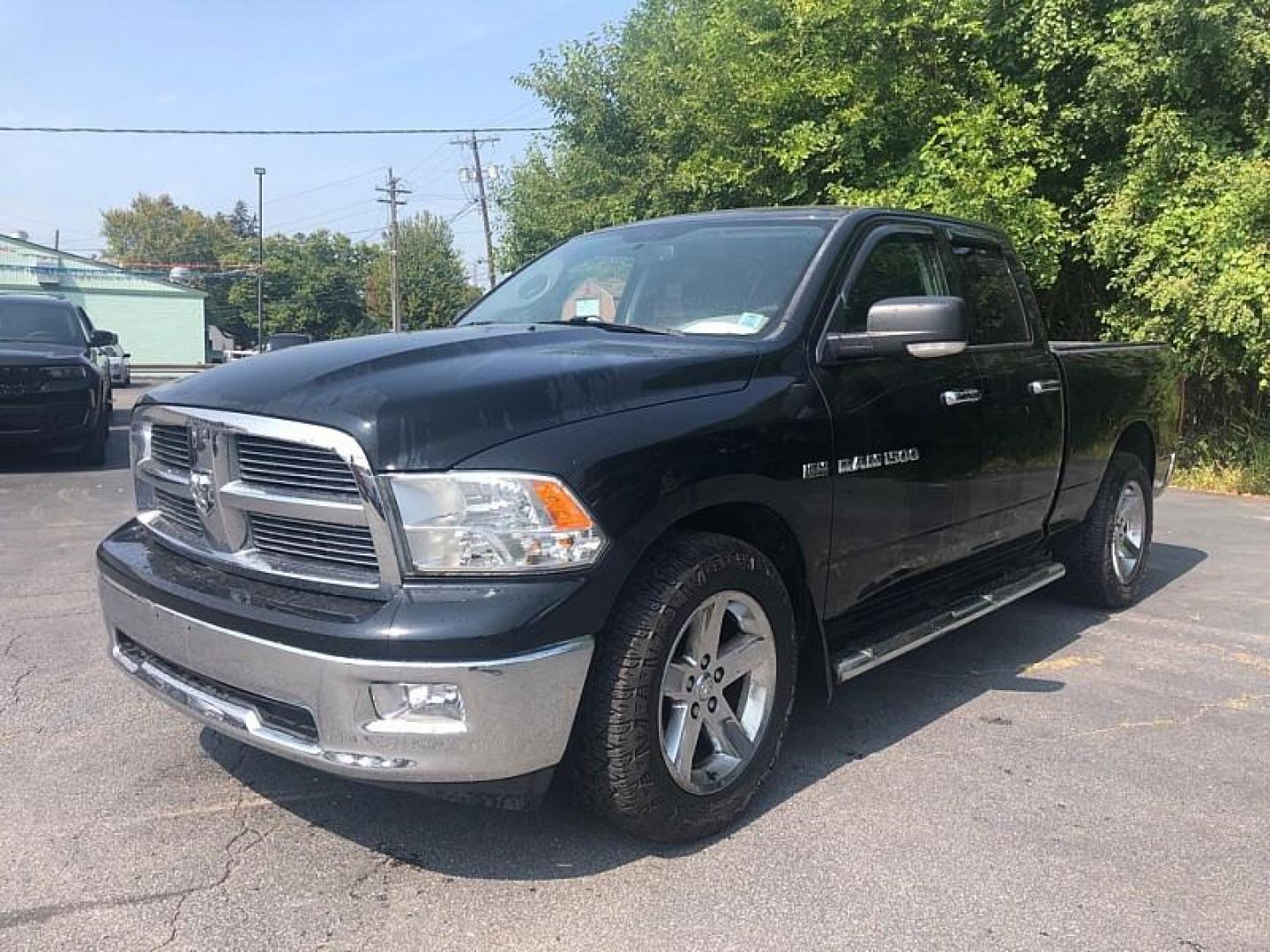 2012 BLACK /TAN Dodge Ram 1500 SLT Quad Cab 4WD (1C6RD7GTXCS) with an 5.7L V8 OHV 16V engine, 5-Speed Automatic transmission, located at 3304 Woodville Road, Northwood, OH, 43619, (419) 210-8019, 41.612694, -83.480743 - Photo#0