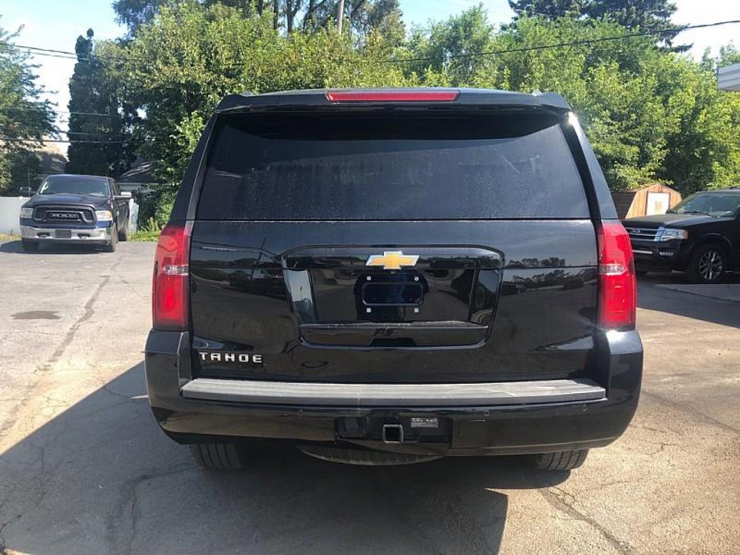 2015 BLACK /BLACK Chevrolet Tahoe LT 2WD (1GNSCBKC0FR) with an 5.3L V8 OHV 16V engine, 6-Speed Automatic transmission, located at 3304 Woodville Road, Northwood, OH, 43619, (419) 210-8019, 41.612694, -83.480743 - We are #1 Auto Loan Dealer for Good Bad or No Credit we have hundreds of vehicles to choose from, stop on in or just fill out our online application to get approved for auto financing and see your credit score for free by visiting our website today. We have Low Payment Options and Terms Available - Photo#3