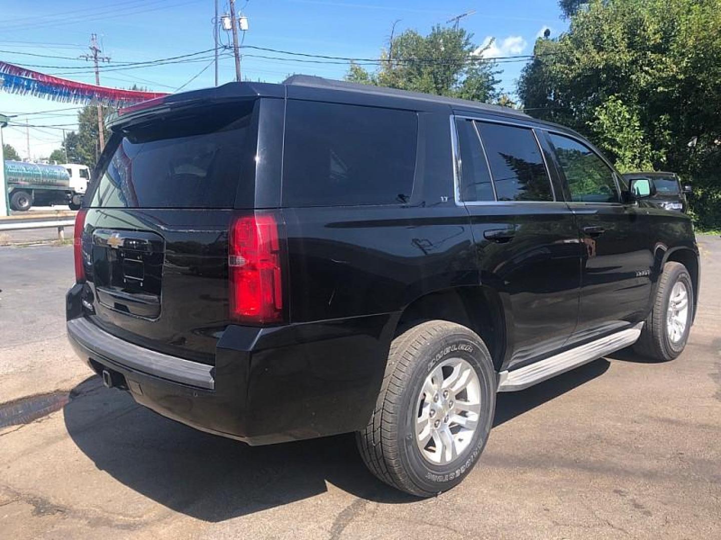 2015 BLACK /BLACK Chevrolet Tahoe LT 2WD (1GNSCBKC0FR) with an 5.3L V8 OHV 16V engine, 6-Speed Automatic transmission, located at 3304 Woodville Road, Northwood, OH, 43619, (419) 210-8019, 41.612694, -83.480743 - We are #1 Auto Loan Dealer for Good Bad or No Credit we have hundreds of vehicles to choose from, stop on in or just fill out our online application to get approved for auto financing and see your credit score for free by visiting our website today. We have Low Payment Options and Terms Available - Photo#4