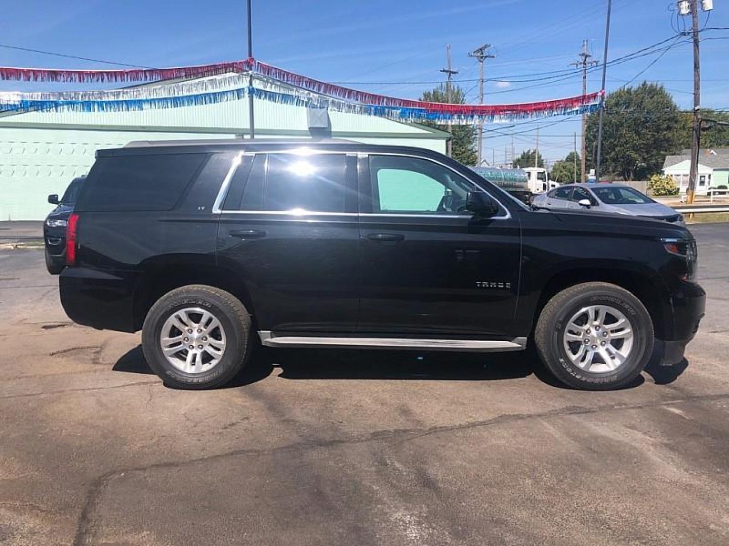 2015 BLACK /BLACK Chevrolet Tahoe LT 2WD (1GNSCBKC0FR) with an 5.3L V8 OHV 16V engine, 6-Speed Automatic transmission, located at 3304 Woodville Road, Northwood, OH, 43619, (419) 210-8019, 41.612694, -83.480743 - We are #1 Auto Loan Dealer for Good Bad or No Credit we have hundreds of vehicles to choose from, stop on in or just fill out our online application to get approved for auto financing and see your credit score for free by visiting our website today. We have Low Payment Options and Terms Available - Photo#5