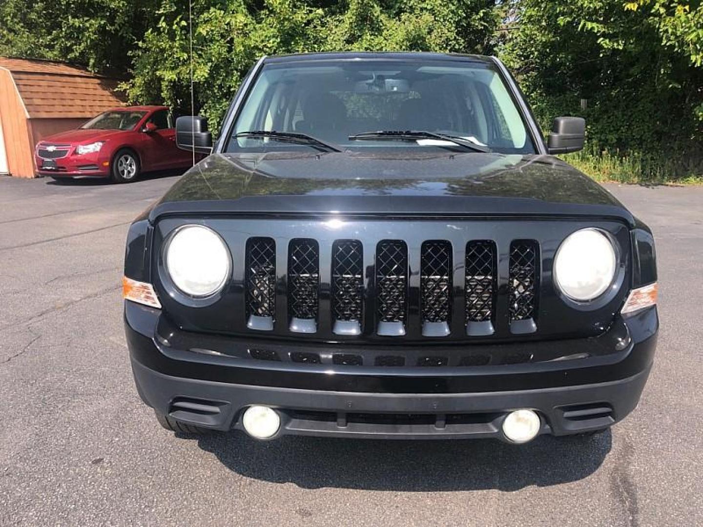 2014 BLACK /BLACK Jeep Patriot Latitude 4WD (1C4NJRFB0ED) with an 2.4L L4 DOHC 16V engine, Automatic 6-Spd w/AutoStick transmission, located at 3304 Woodville Road, Northwood, OH, 43619, (419) 210-8019, 41.612694, -83.480743 - We are #1 Auto Loan Dealer for Good Bad or No Credit we have hundreds of vehicles to choose from, stop on in or just fill out our online application to get approved for auto financing and see your credit score for free by visiting our website today. We have Low Payment Options and Terms Available - Photo#7