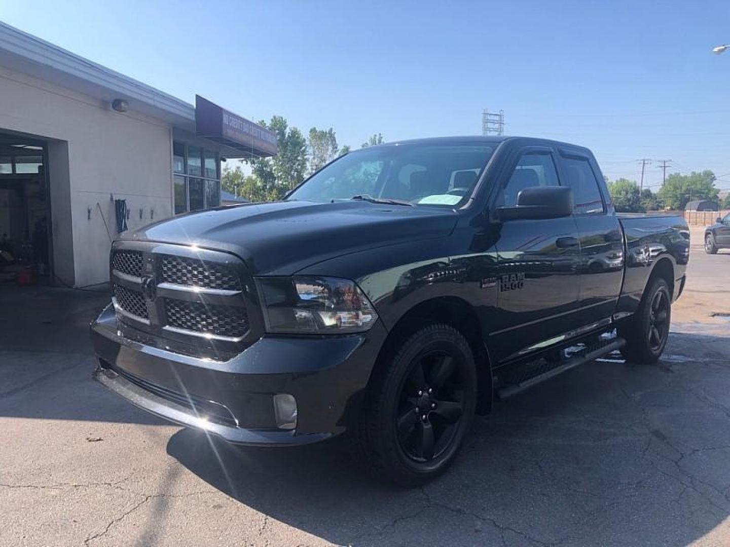 2017 BLACK /GREY RAM 1500 Tradesman Quad Cab 4WD (1C6RR7FT4HS) with an 5.7L V8 OHV 16V engine, 8A transmission, located at 3304 Woodville Road, Northwood, OH, 43619, (419) 210-8019, 41.612694, -83.480743 - Photo#0