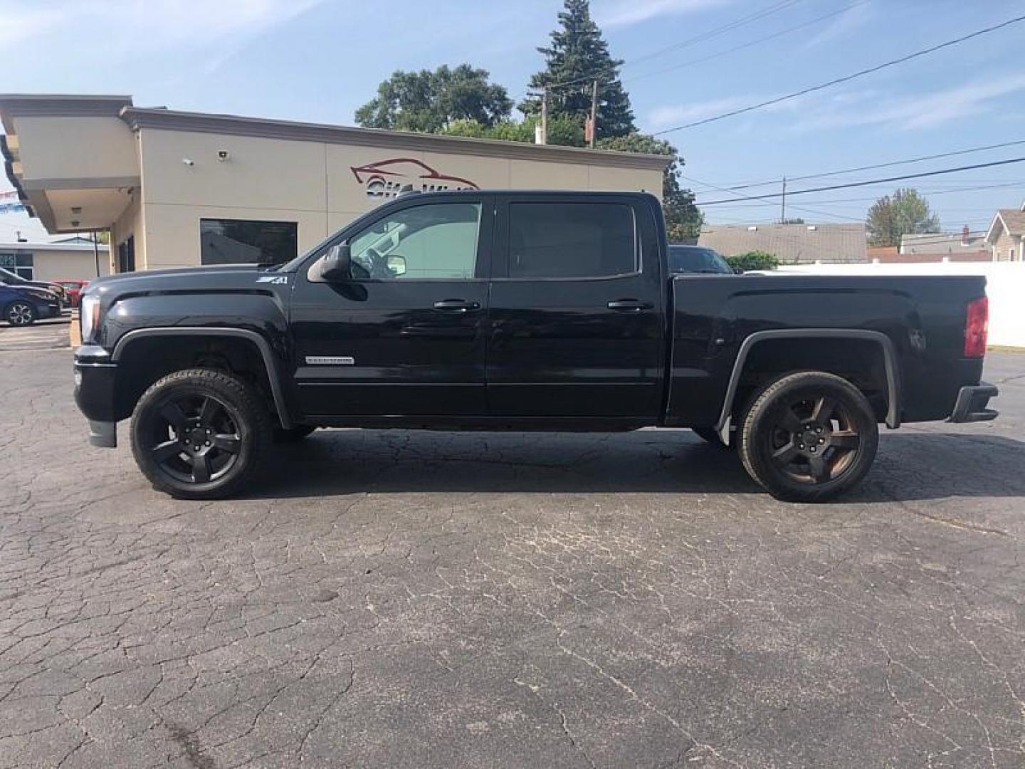 2018 BLACK /BLACK GMC Sierra 1500 SLE Crew Cab Long Box 4WD (3GTU2MEC5JG) with an 5.3L V8 OHV 16V engine, 6A transmission, located at 3304 Woodville Road, Northwood, OH, 43619, (419) 210-8019, 41.612694, -83.480743 - We are #1 Auto Loan Dealer for Good Bad or No Credit we have hundreds of vehicles to choose from, stop on in or just fill out our online application to get approved for auto financing and see your credit score for free by visiting our website today. We have Low Payment Options and Terms Available - Photo#1