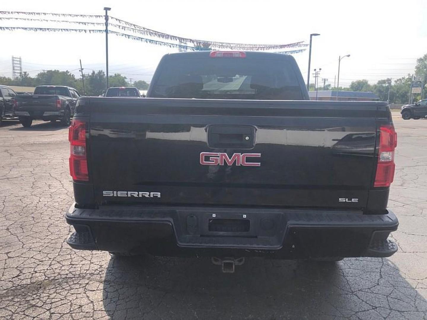 2018 BLACK /BLACK GMC Sierra 1500 SLE Crew Cab Long Box 4WD (3GTU2MEC5JG) with an 5.3L V8 OHV 16V engine, 6A transmission, located at 3304 Woodville Road, Northwood, OH, 43619, (419) 210-8019, 41.612694, -83.480743 - We are #1 Auto Loan Dealer for Good Bad or No Credit we have hundreds of vehicles to choose from, stop on in or just fill out our online application to get approved for auto financing and see your credit score for free by visiting our website today. We have Low Payment Options and Terms Available - Photo#3