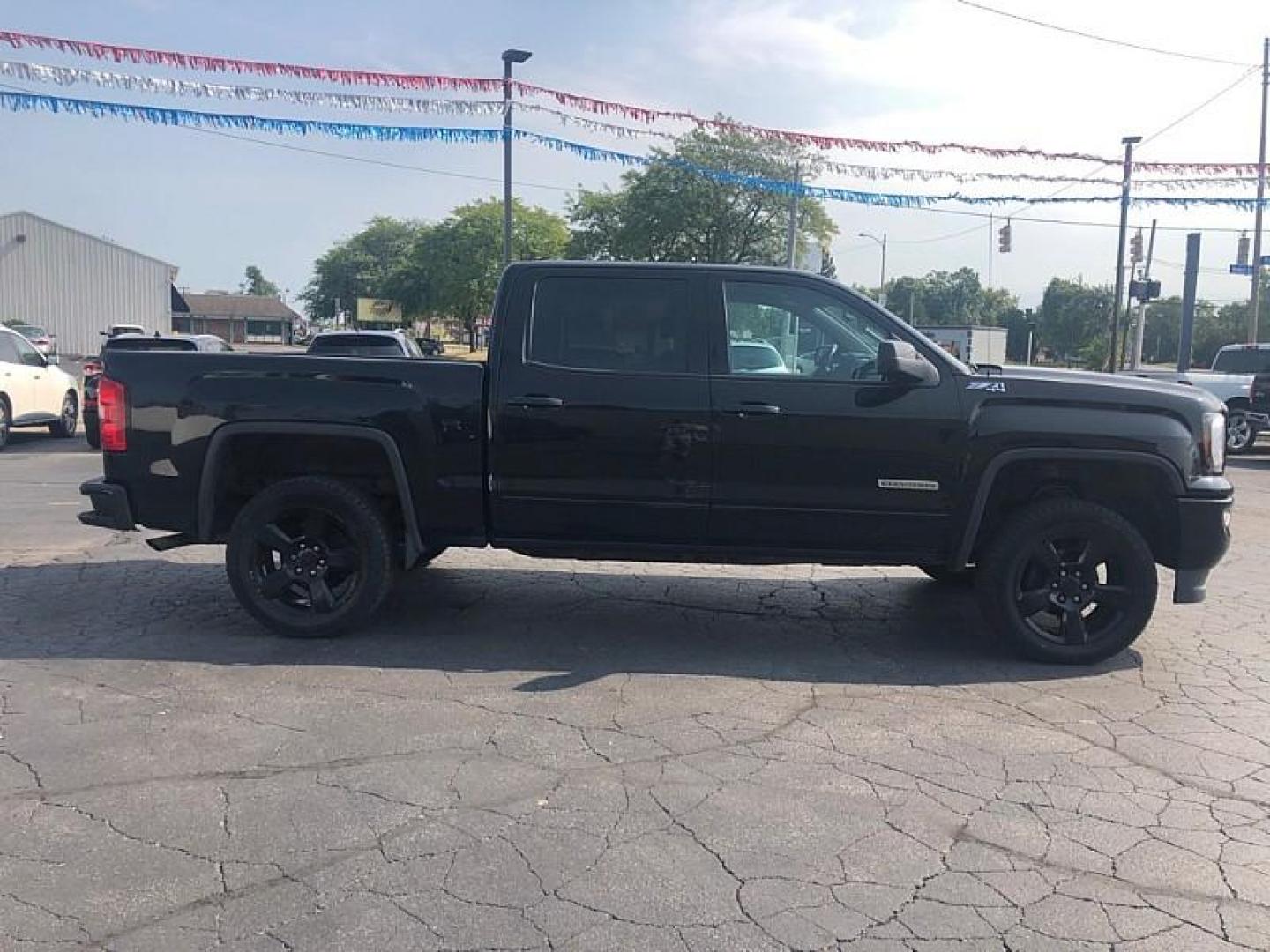 2018 BLACK /BLACK GMC Sierra 1500 SLE Crew Cab Long Box 4WD (3GTU2MEC5JG) with an 5.3L V8 OHV 16V engine, 6A transmission, located at 3304 Woodville Road, Northwood, OH, 43619, (419) 210-8019, 41.612694, -83.480743 - We are #1 Auto Loan Dealer for Good Bad or No Credit we have hundreds of vehicles to choose from, stop on in or just fill out our online application to get approved for auto financing and see your credit score for free by visiting our website today. We have Low Payment Options and Terms Available - Photo#5