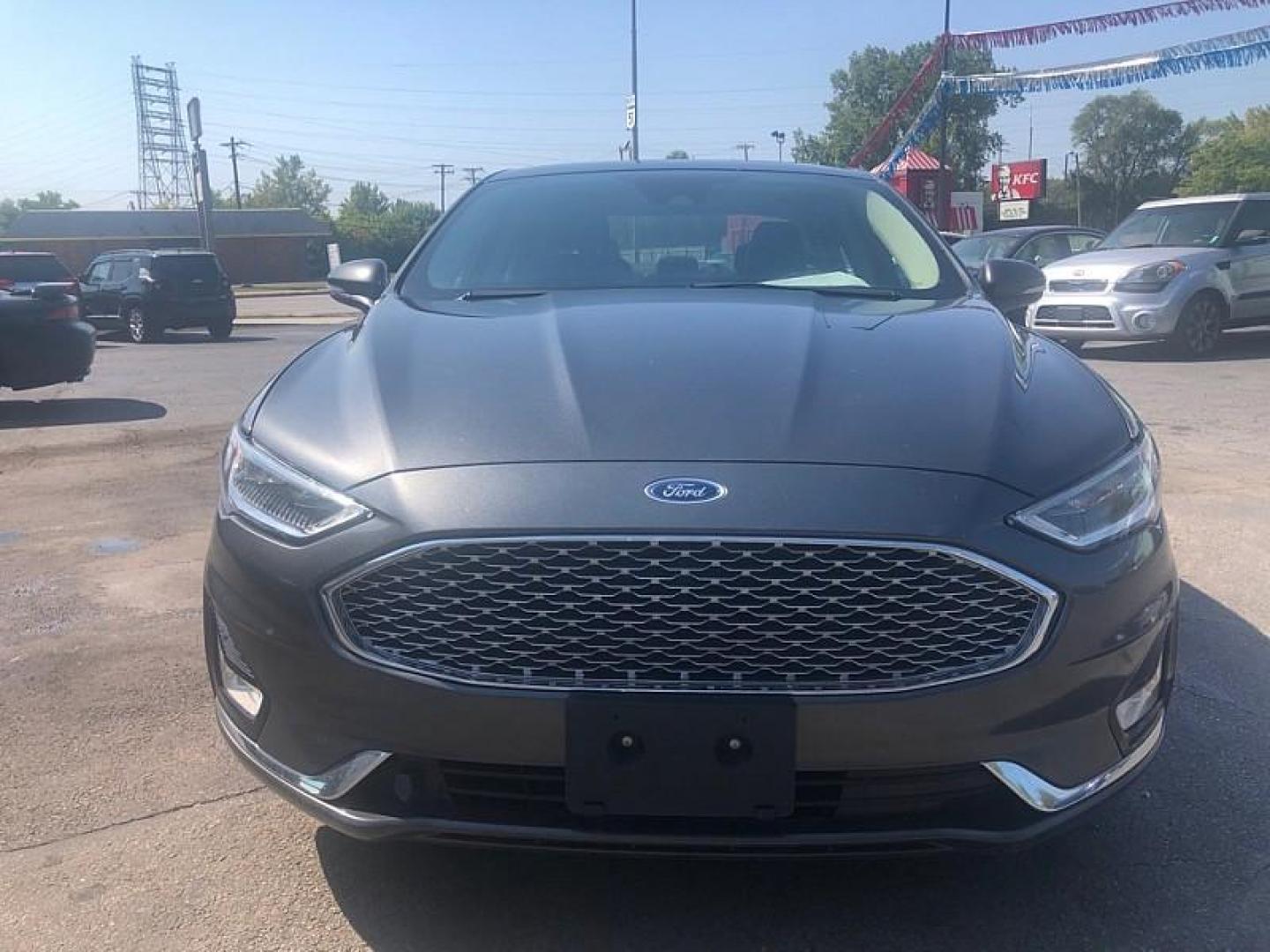 2019 GRAY /BLACK Ford Fusion Hybrid Titanium (3FA6P0RU2KR) with an 2.0L L4 DOHC 16V HYBRID engine, CVT transmission, located at 3304 Woodville Road, Northwood, OH, 43619, (419) 210-8019, 41.612694, -83.480743 - We are #1 Auto Loan Dealer for Good Bad or No Credit we have hundreds of vehicles to choose from, stop on in or just fill out our online application to get approved for auto financing and see your credit score for free by visiting our website today. We have Low Payment Options and Terms Available - Photo#7